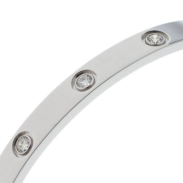 Part of the 'Love' collection. we have spotted this elegant Cartier bracelet on many celebs and models. It features a bangle style crafted from an 18k white gold and embedded with diamonds around it. The sleek pattern can be stacked with similar