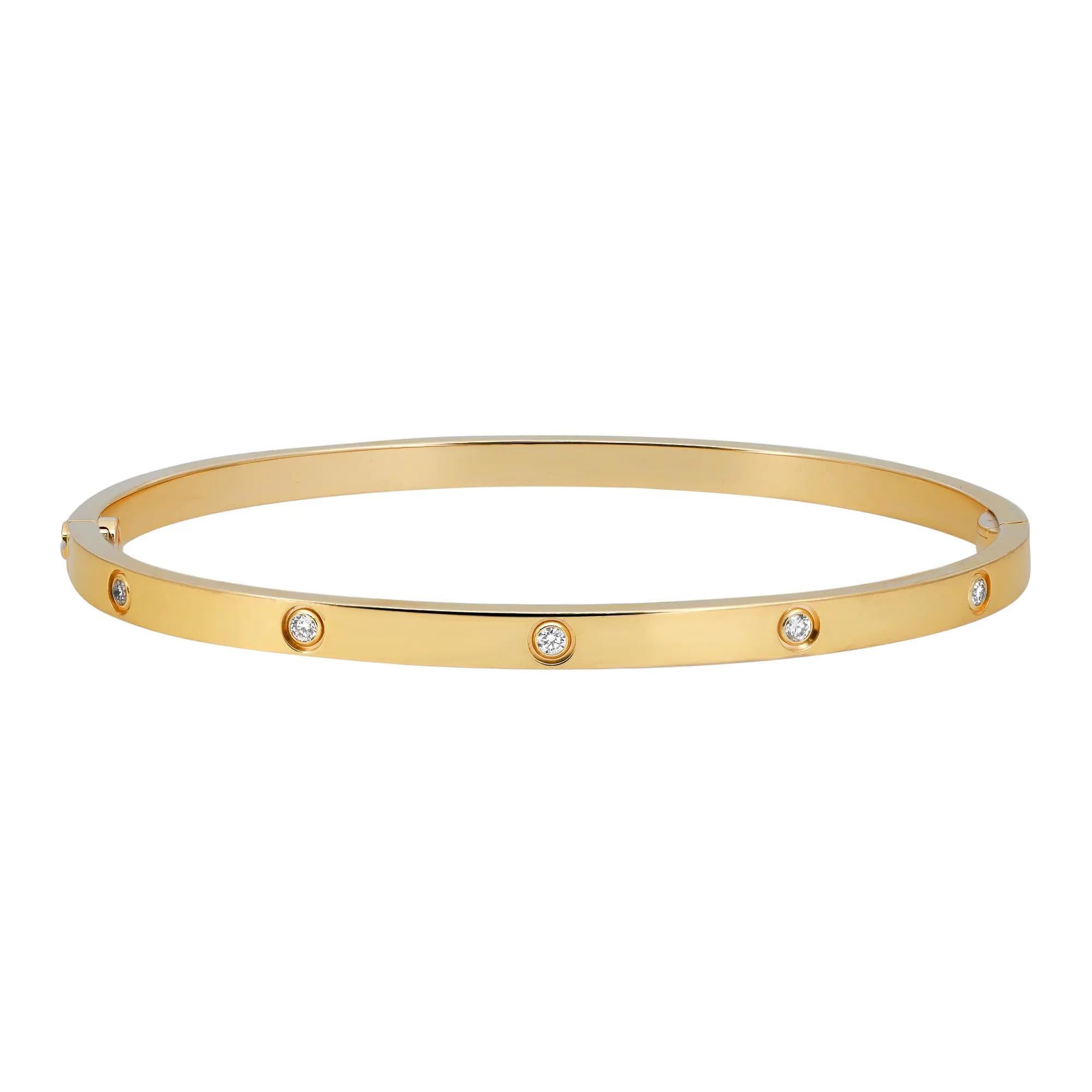 Bracciale Cartier Love 10 diamanti modello piccolo. Realizzato in oro giallo 18 carati. Larghezza: 3,65 mm. Taglia 18. Ottime condizioni d'uso. Peso totale: 20 grammi. Viene fornito con la scatola originale di Cartier e il certificato.  