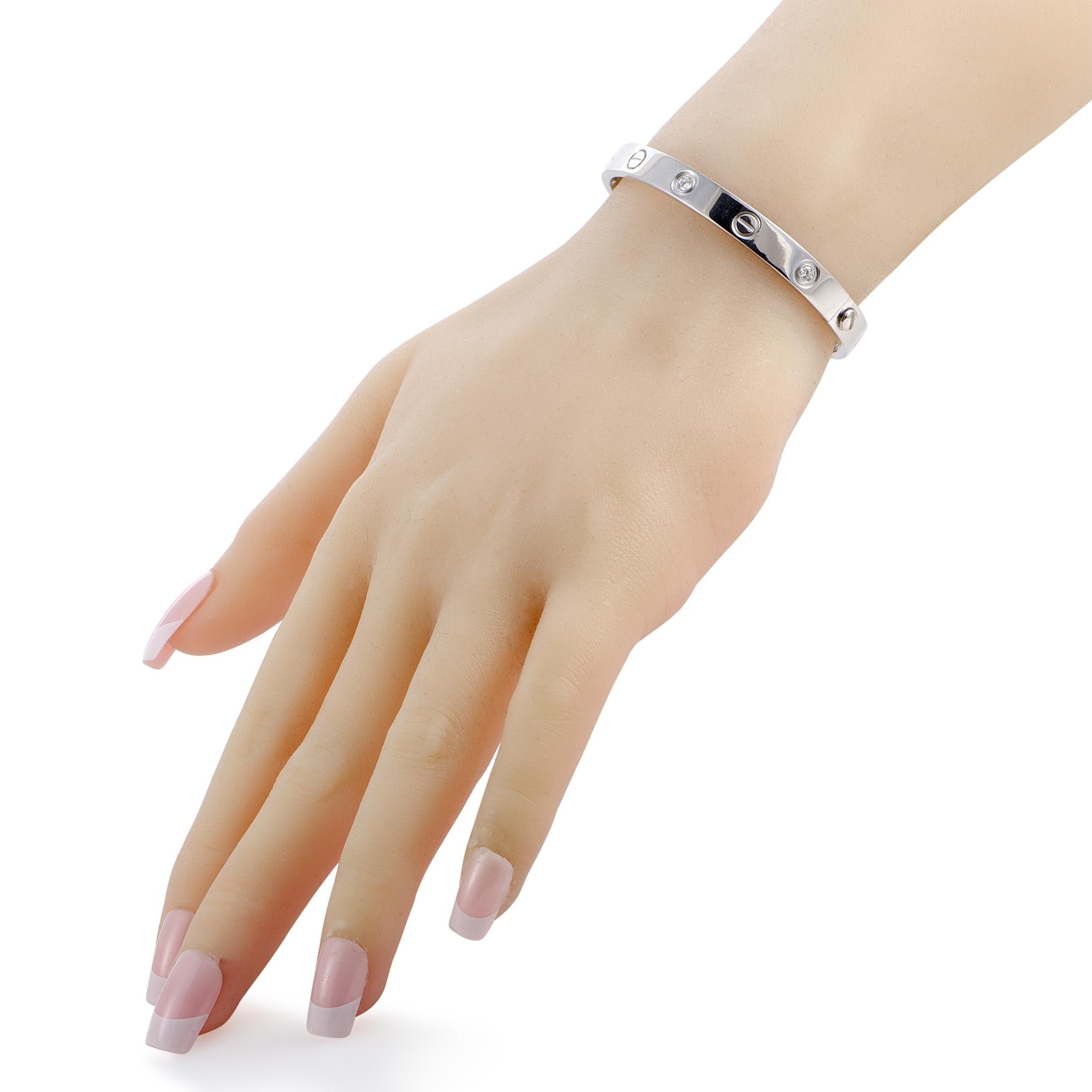 The Cartier “LOVE” bracelet is crafted from 18K white gold and set with six diamond stones that weigh 0.60 carats in total. The bracelet weighs 30.7 grams and is offered in size 16, boasting length of 7.00” and diameter of 2.25”.

This item includes