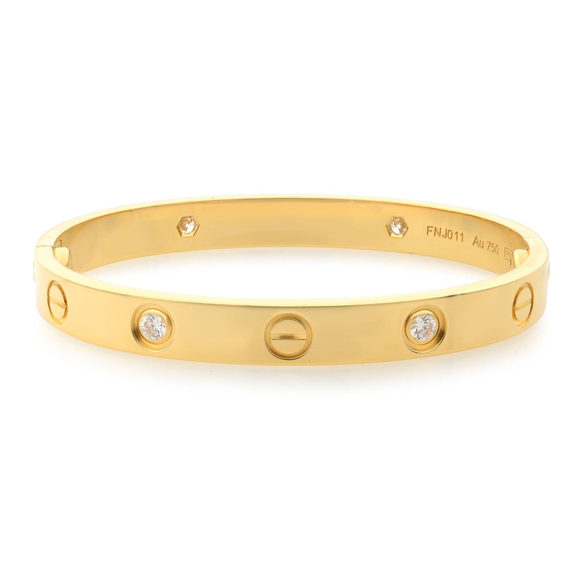 Cartier Love bracelet, 18K yellow gold, set with 4 brilliant-cut diamonds totaling 0.42 carats. Sold with a screwdriver. Width: 6.1mm. Size 15.
Pre-owned, gently used. Come with box and a screw driver. Authenticity papers are not included. 

ABOUT