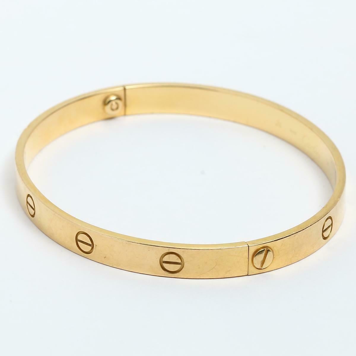 Cartier Love 18 Karat Yellow Gold Bangle Bracelet Authentic, E56680 In Excellent Condition In New York, NY