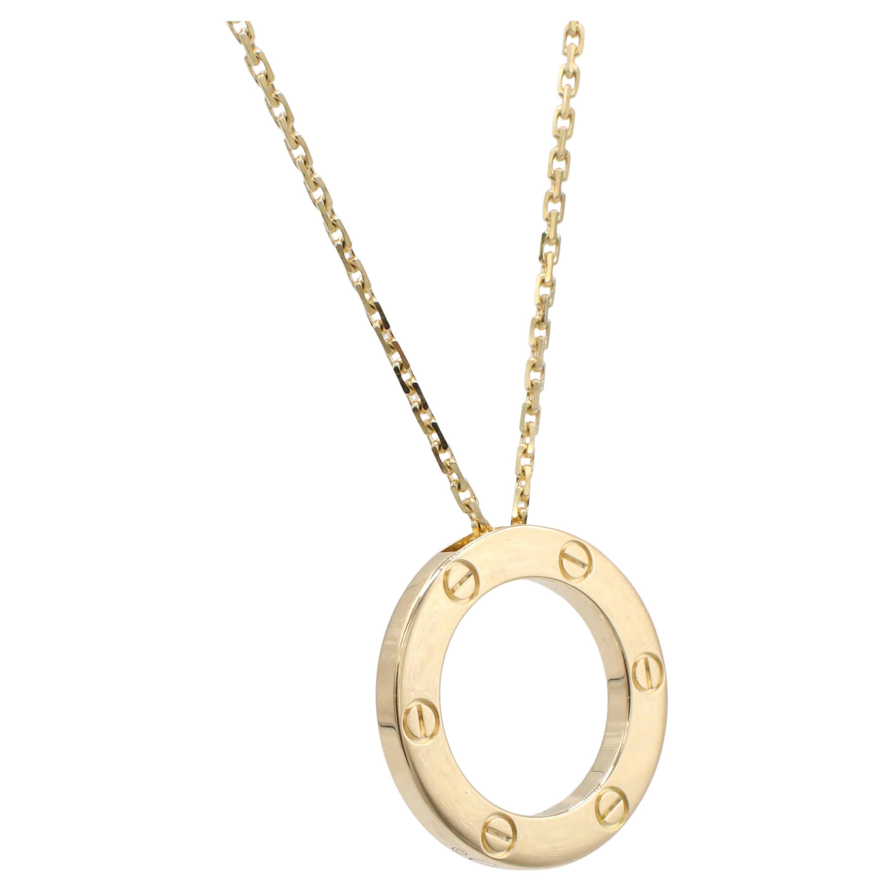 Cartier Love 18 Karat Yellow Gold Pendant Drop Necklace Box & Papers
Metal: 18k yellow gold
Weight: 13.17 grams
Chain: 16.5 inches
Inner Diameter: 16mm
Retail: $3,850 USD
Note: Box, papers, receipt 