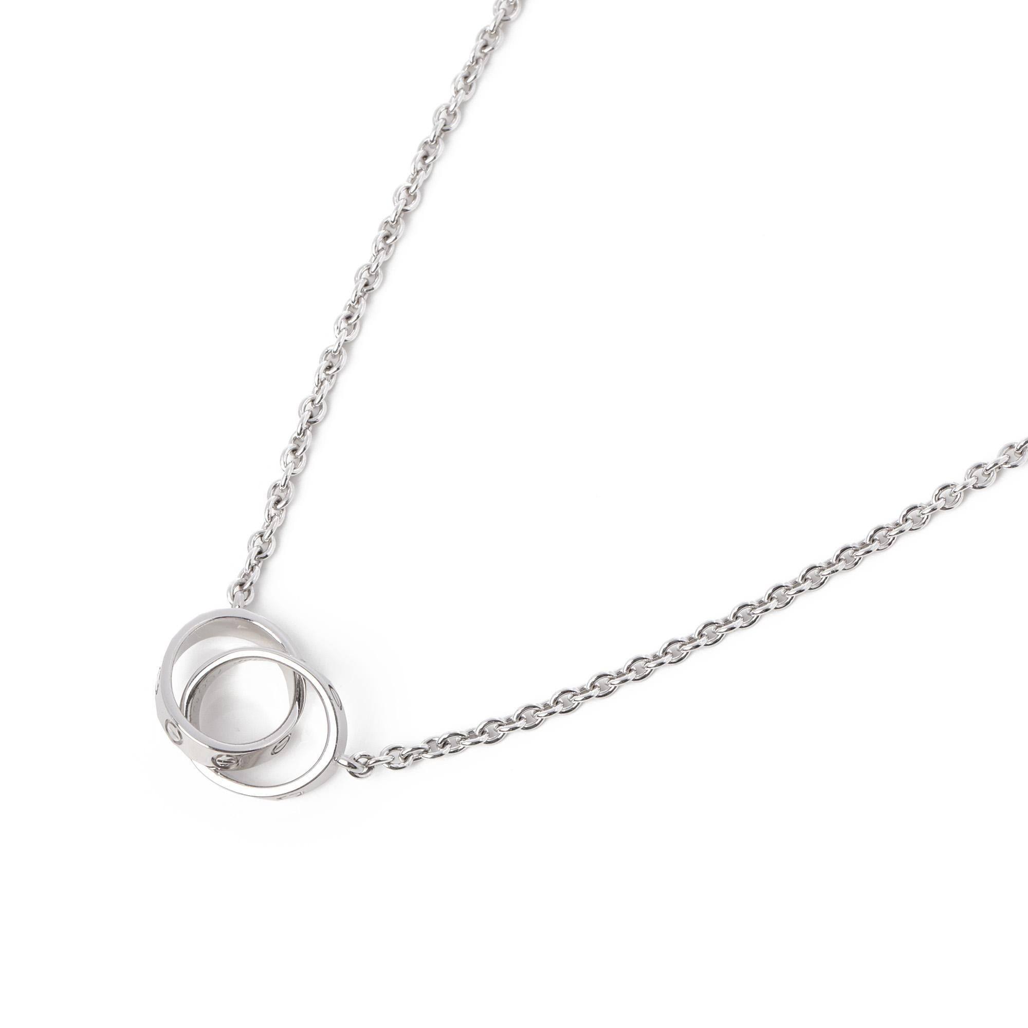 This necklace by Cartier is from their Love collection and features two interlinking pendants with their iconic screw detailing, set in 18k white gold. Accompanied by a Xupes presentation box. Our Xupes reference is J559 should you need to quote