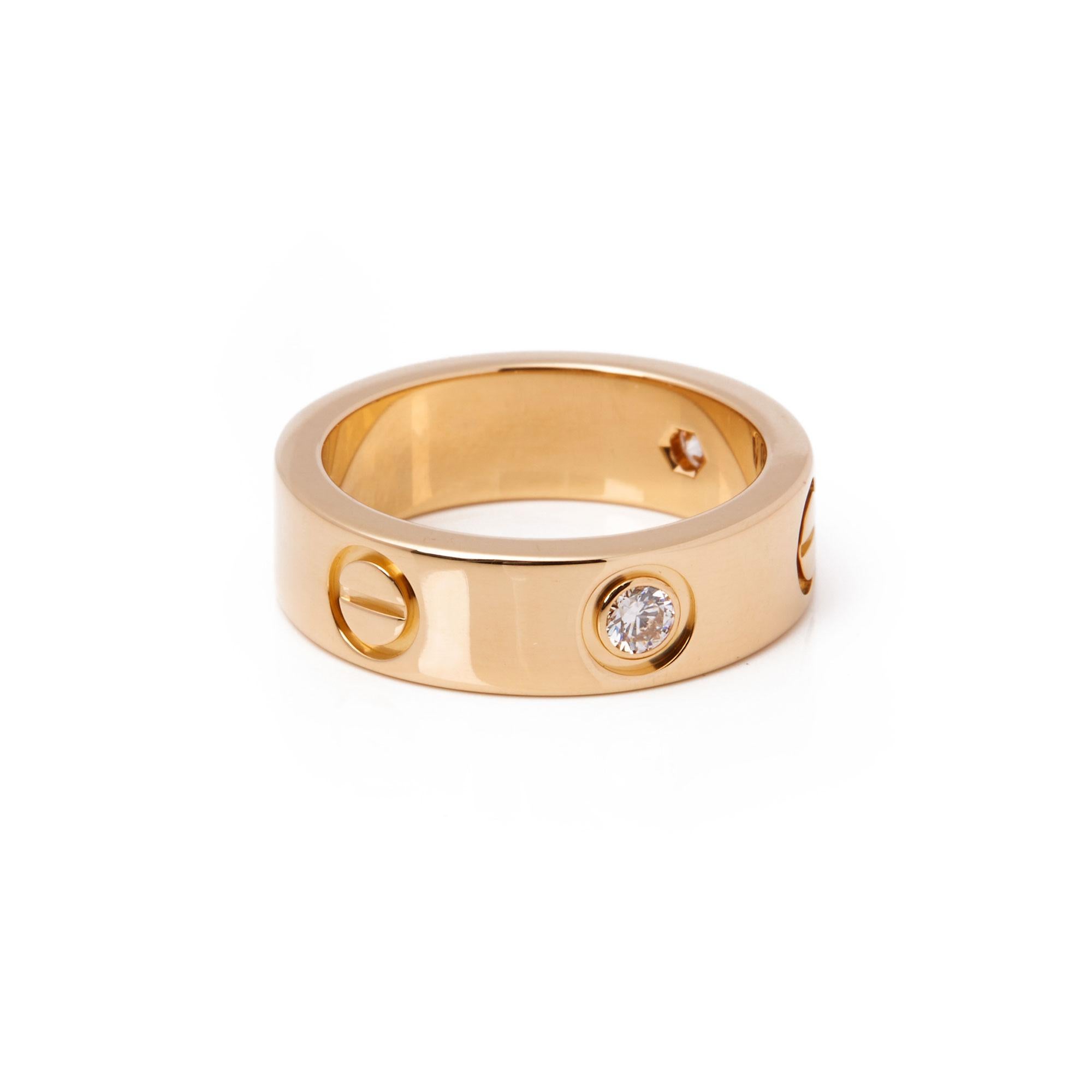 This ring by Cartier is from their signature Love collection and features three round brilliant cut diamonds. Mounted in 18k yellow gold. UK ring size J 1/2. EU ring size 49. US ring size 5. Complete with Xupes presentation box. Our Xupes reference