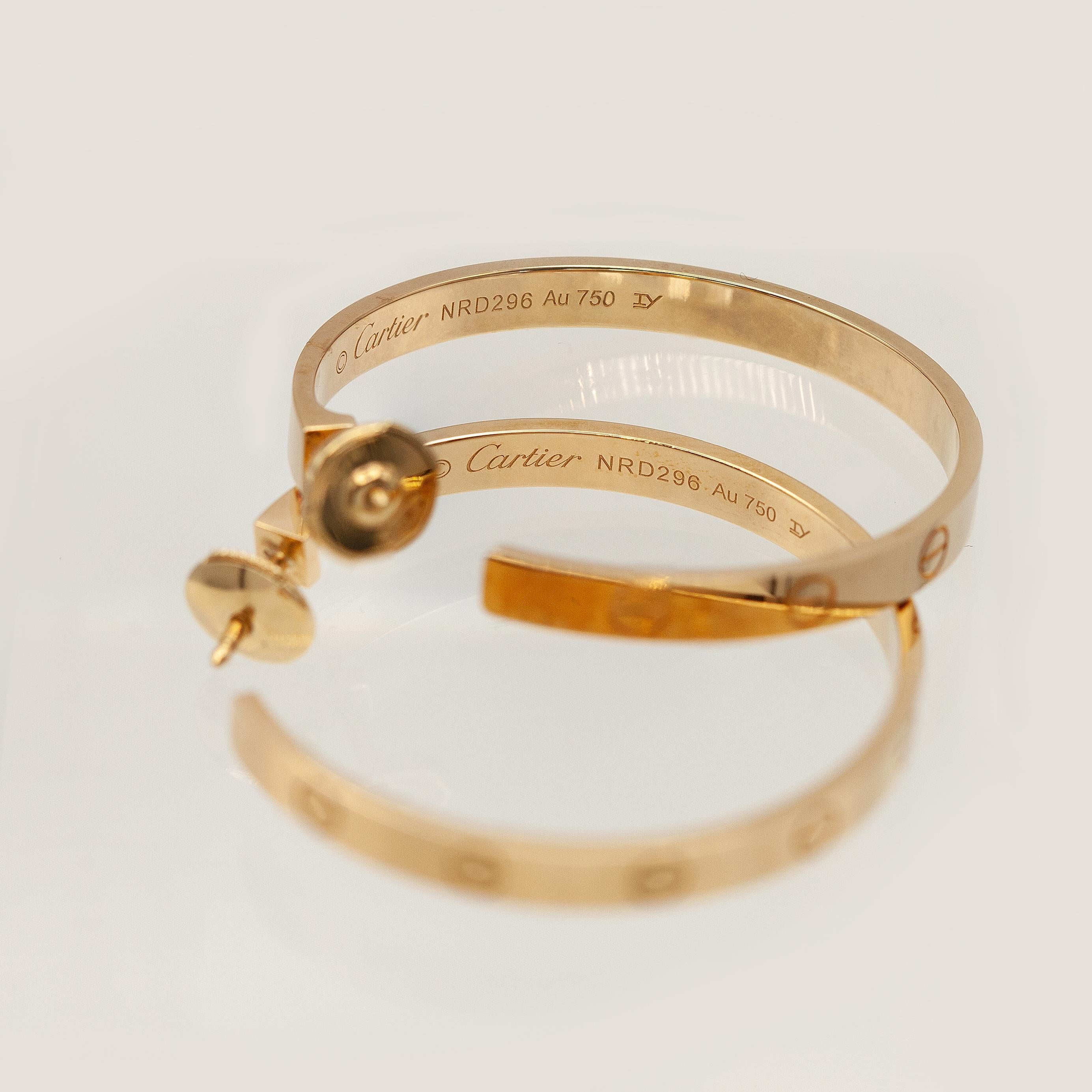 Boucles d'oreilles larges en or 18K Cartier Love Bon état - En vente à New York, NY