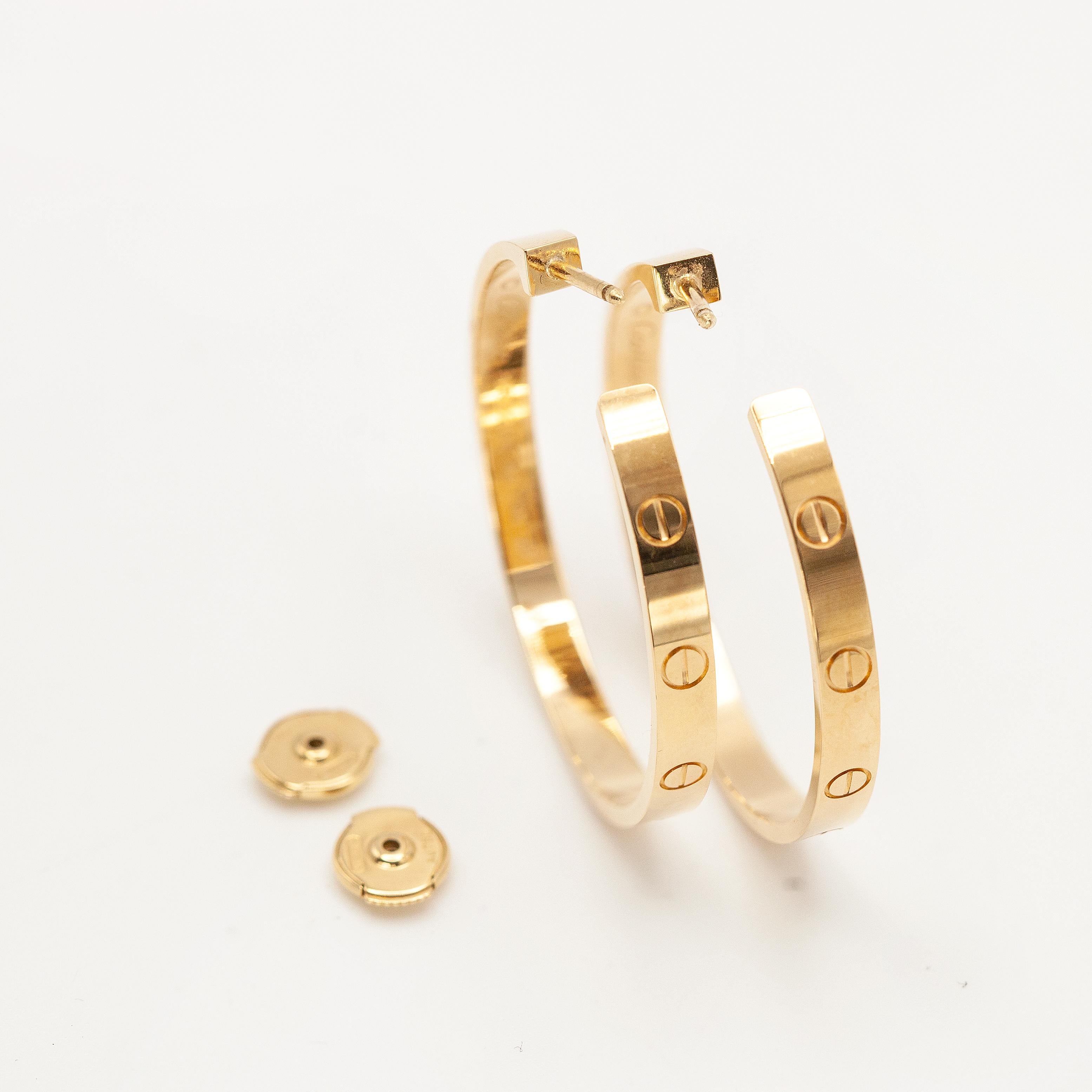 Boucles d'oreilles larges en or 18K Cartier Love Unisexe en vente