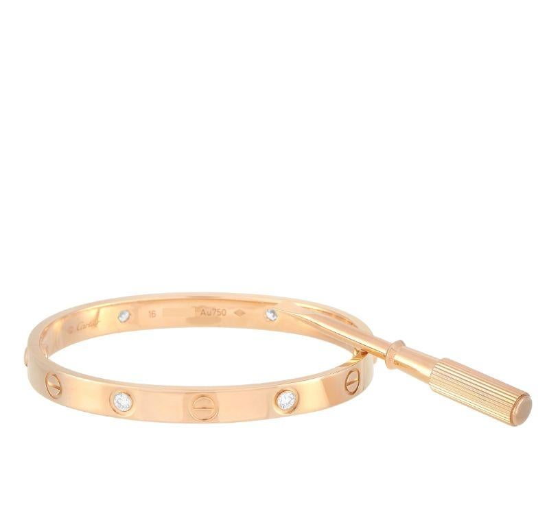 This Cartier LOVE bracelet is a timeless addition to any jewelry collection. The iconic design comes to life thanks to 4 sparkling round-cut diamonds, which effortlessly accent the 18K Rose Gold setting. This size 16 bracelet measures 6.3” long. 

