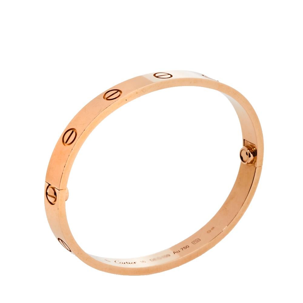 Cartier's Love bracelet is a modern symbol of luxury and a way to lock in one's love. Designed in an oval shape to comfortably sit around your wrist, the iconic love handcuff is laid with distinct screw motifs and secured by a screw closure. This