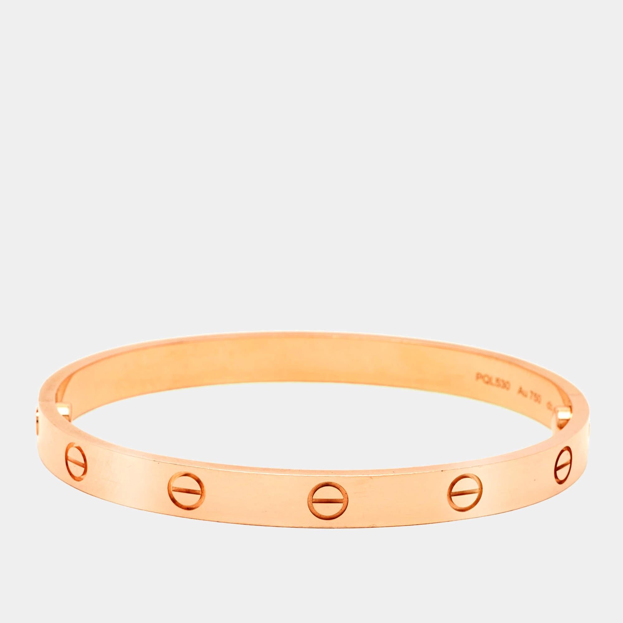 Cartier's Love bracelet is a modern symbol of luxury and a way to lock in one's love. Designed in an oval shape to comfortably sit around your wrist, the iconic love handcuff is laid with distinct screw motifs and secured by screw