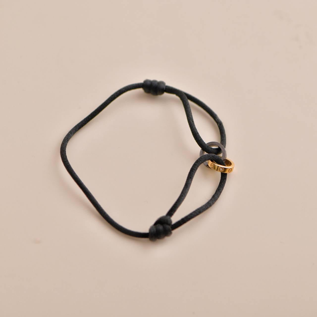 SKU	AT-2584
Comes With	Pouch Only
Date	2017
Model	B6040100
Serial Number	DM****
Metal	18k Rose Gold
Stones	Diamond
Weight	3.5 g
Width	0.75 mm
Condition	Excellent
Other Info	Inner Diameter of the Two Rings: approx 8 mm Outer Diameter of the Two