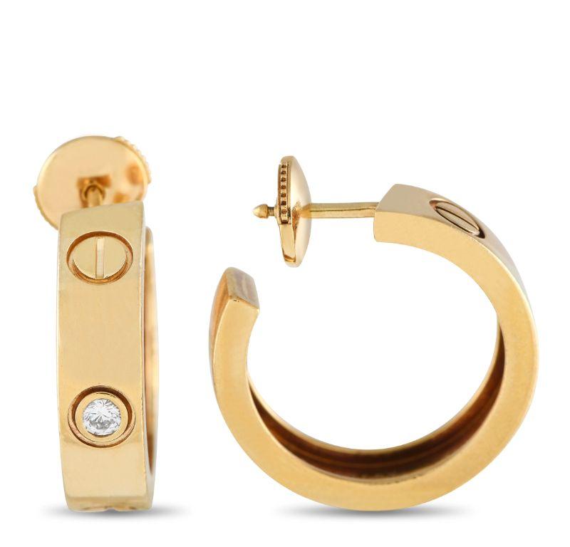 A singular bezel set diamond accents each one of these iconic Cartier LOVE earrings. Understated enough for everyday wear, each one measures 0.75” round and is crafted from lustrous 18K Rose Gold. 
 
 This jewelry piece is offered in estate
