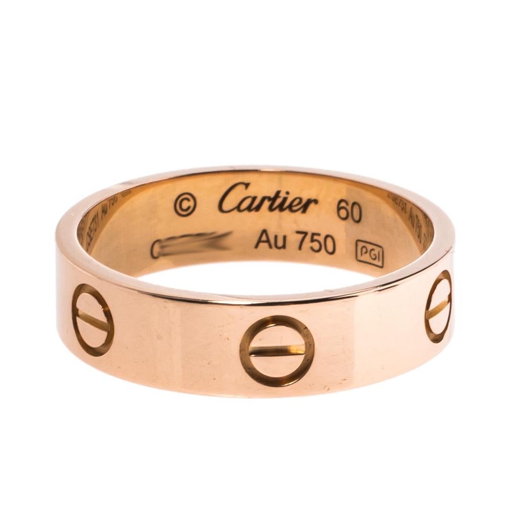 One of the most iconic and loved designs from the house of Cartier, this stunning LOVE ring is an icon of style and luxury. Constructed in 18k rose gold, this ring features screw details all around the surface as symbols of a sealed and secured