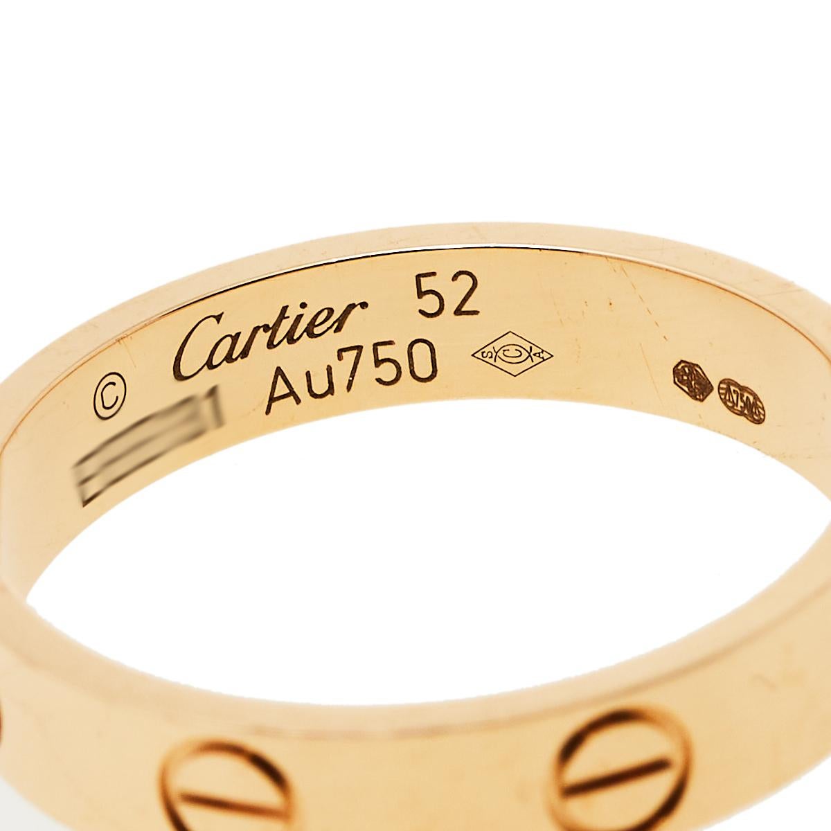 One of the most loved designs from the house of Cartier, this stunning Love ring is an icon of style and luxury. Constructed in 18k rose gold, this ring features screw details all around the surface as symbols of a sealed and secured bond. This ring