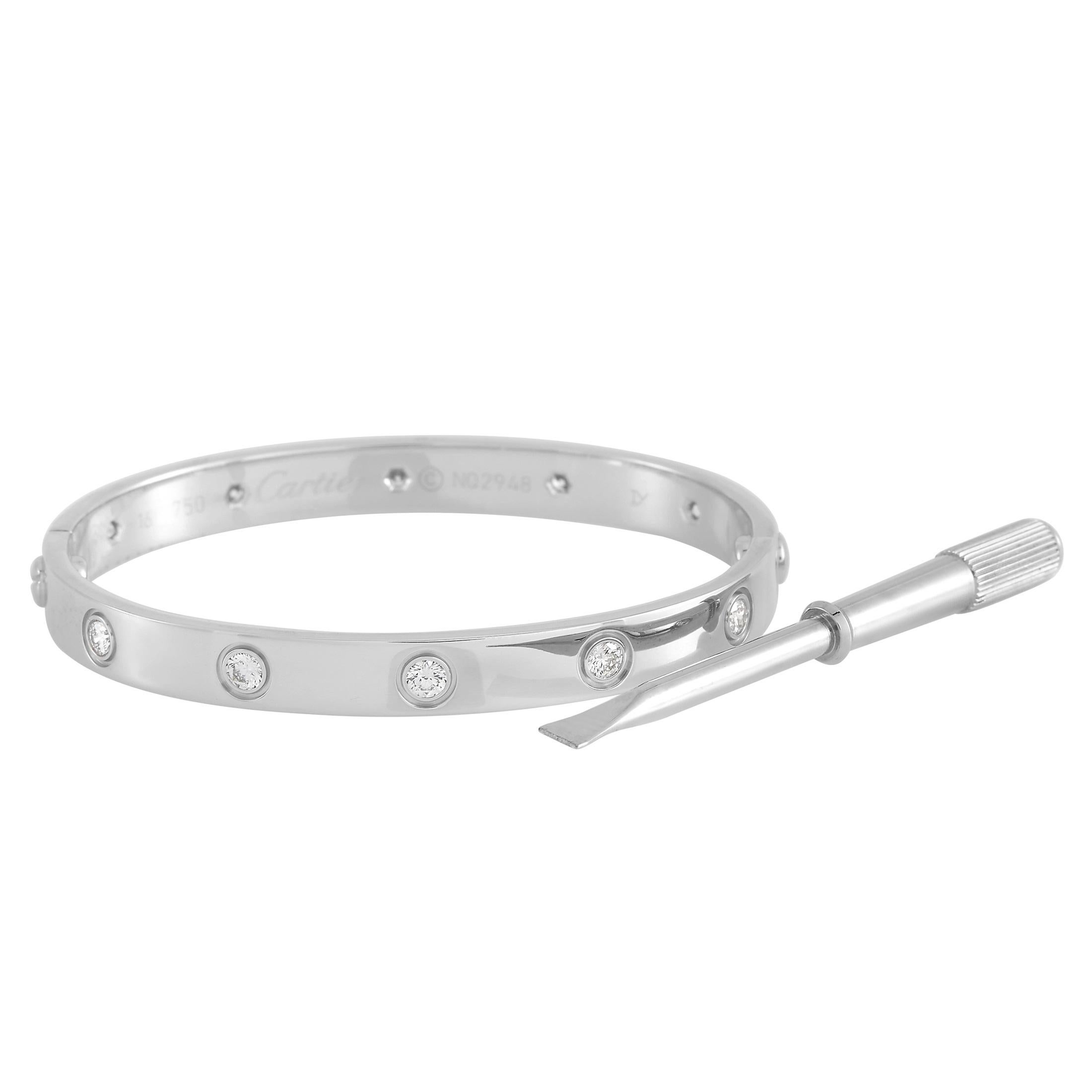 This Cartier Love bracelet proves that even minimalist pieces can make a statement. Encircling the iconic 18K White Gold bangle-style bracelet, you’ll find 10 glittering round-cut diamonds. A size 16, this piece measures 6.3” long and includes the