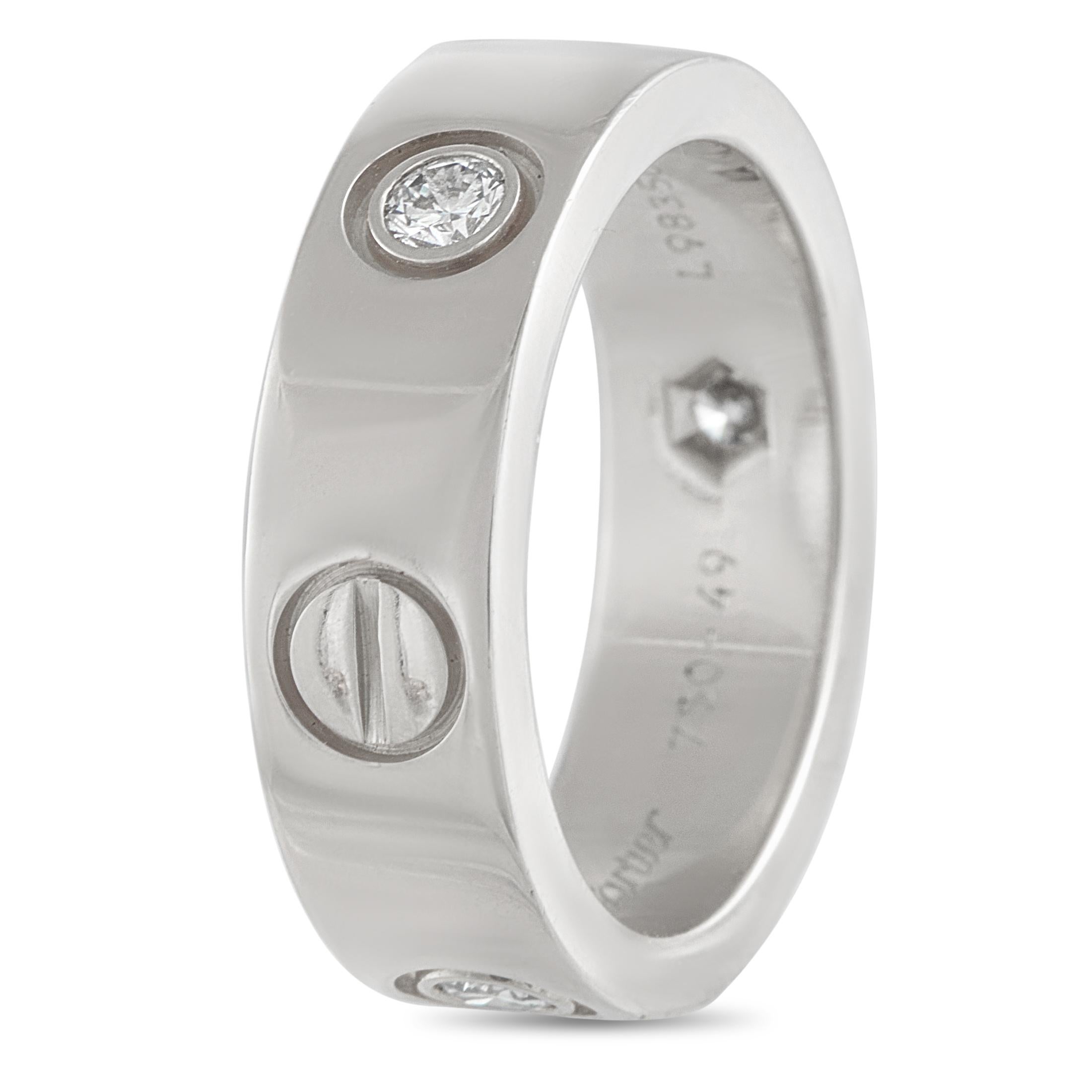 This Cartier LOVE ring exudes obvious elegance. Crafted from 18K White Gold, a series of 3 inset Diamonds alternate with the brands signature circle motif. It measures 6mm wide and features a 2mm top height.This jewelry piece is offered in estate