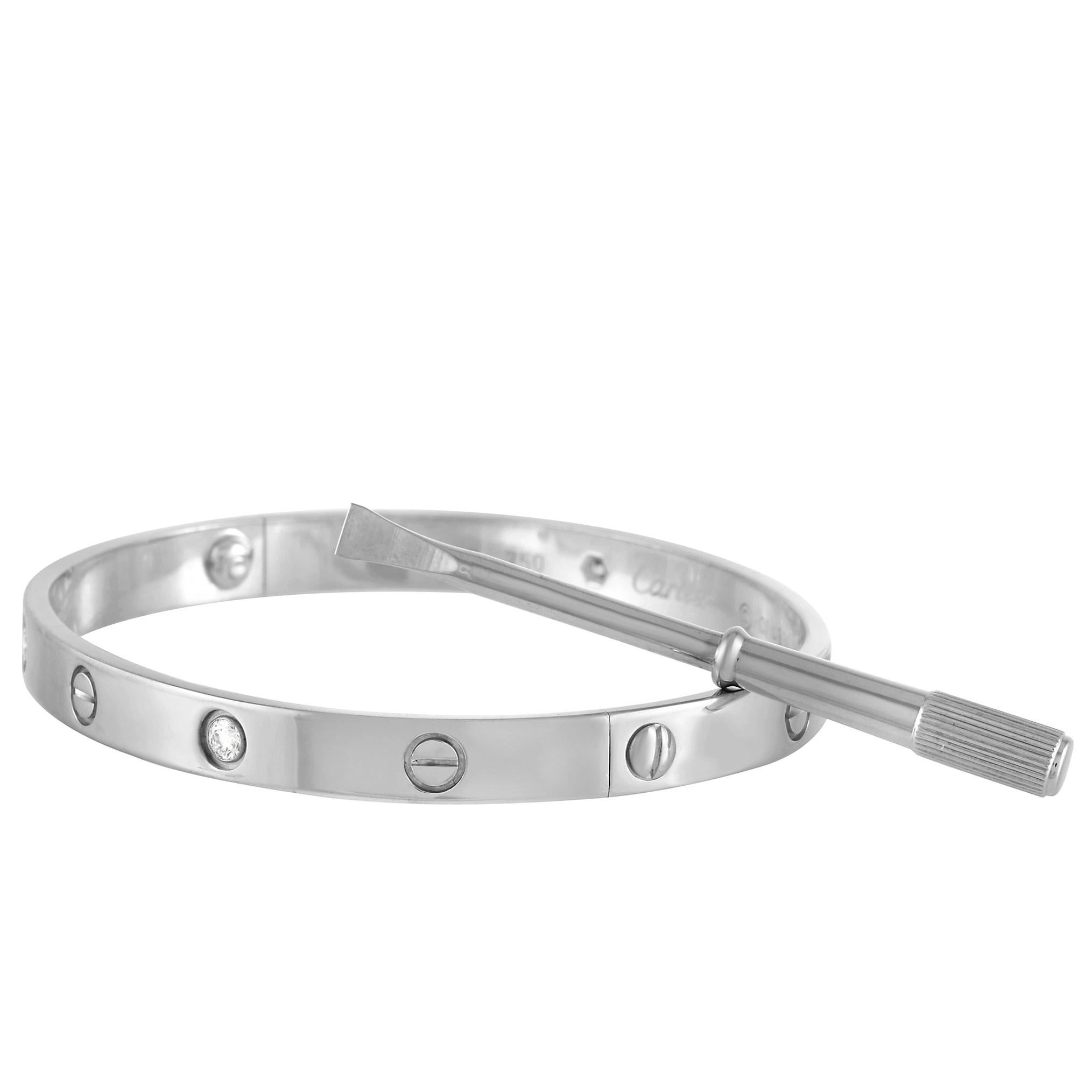 It doesn’t get any more iconic than this 7.5” bangle bracelet from the Cartier Love collection. Adorned with 4 diamonds and the brand’s signature screw accents, this size 19 bracelet is ideal for everyday wear. 

