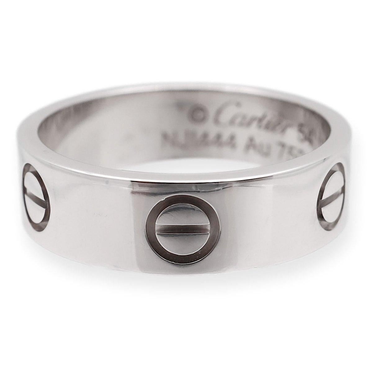 Cartier ring from the LOVE collection finely crafted in 18 white gold with screw motifs. Measures 5.5 mm wide. Includes Certificate of Authenticity. Ring is fully hallmarked with logo , serial numbers, size and metal content.

Ring