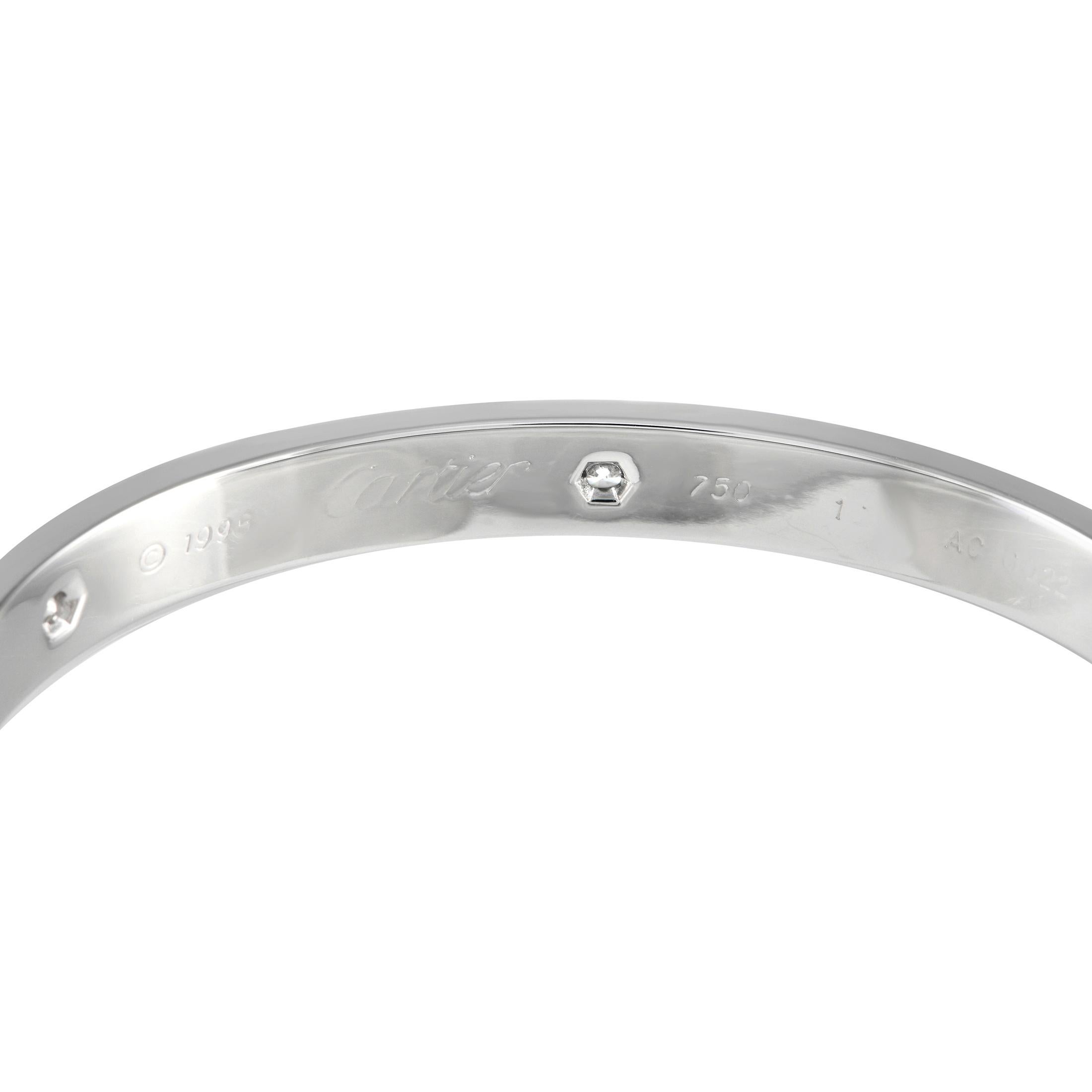 The Cartier Love bracelet - a fine piece of jewelry symbolizing the permanence of true love. This white gold bangle is set with six diamonds laid out alternately with screw motifs. It suits wrists of both men and women and has an classic appeal that