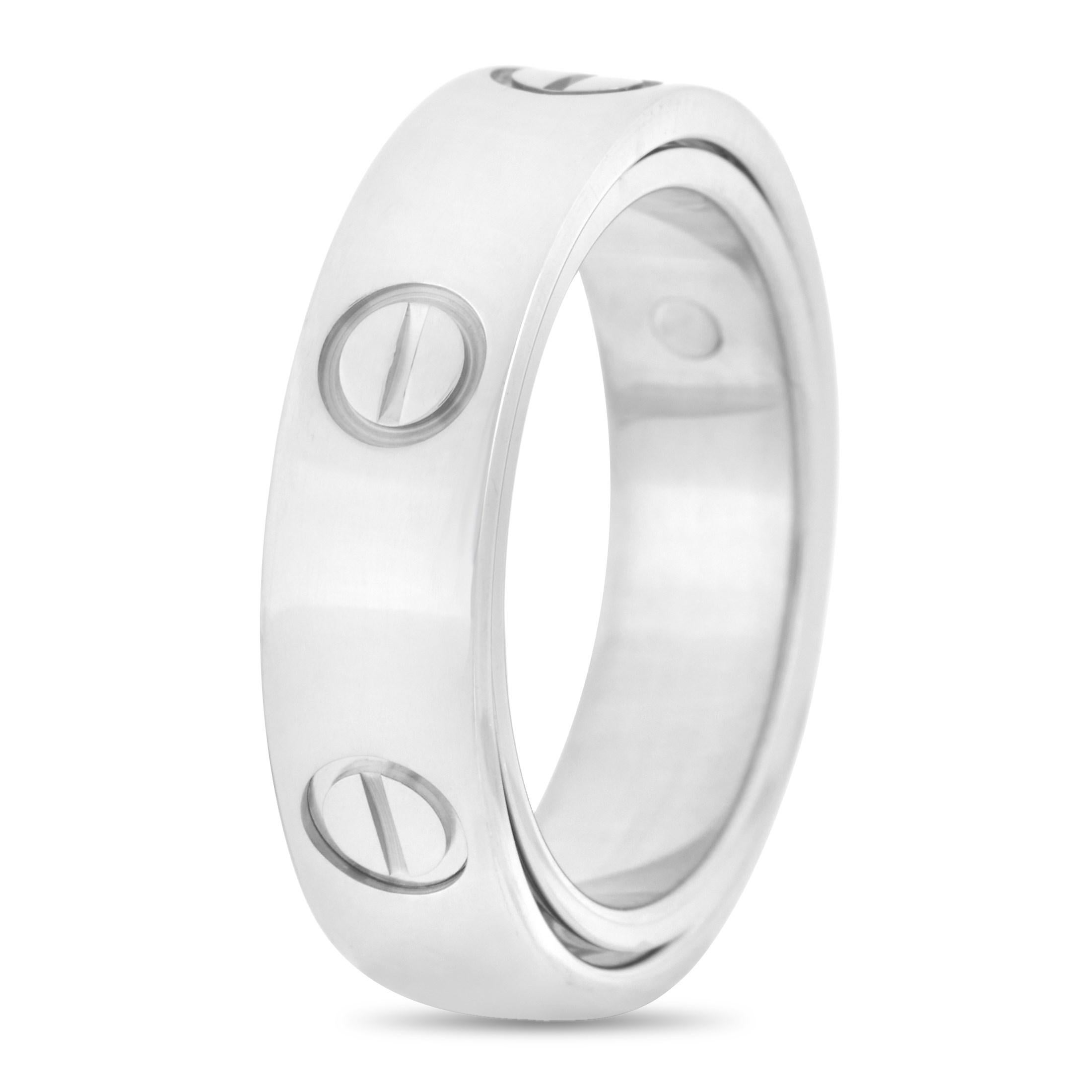 This Cartier love ring is simple but exceptional. It’s created from 18k white gold and features fashionable circle like inscriptions. The ring weighs 10.6 grams with a band thickness of 5mm. 

The ring is offered in estate condition and comes with a