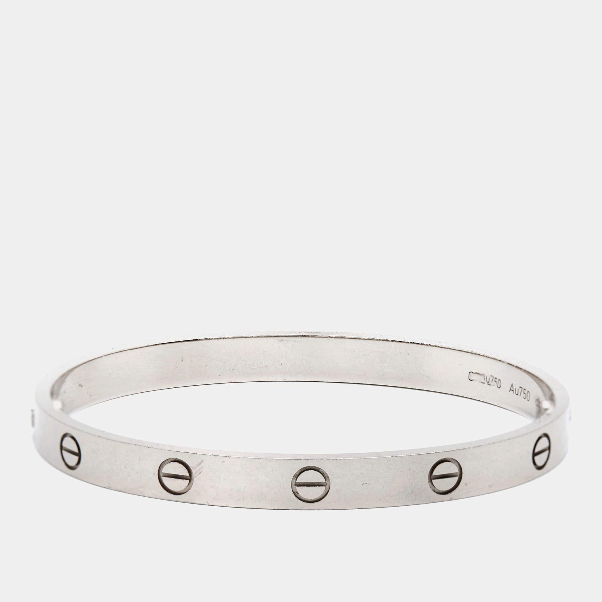 Cartier's Love bracelet is a modern symbol of luxury and a way to lock in one's love. Designed in an elegant shape to comfortably sit around your wrist, the iconic love handcuff is laid with distinct screw motifs and secured by screw closure. This