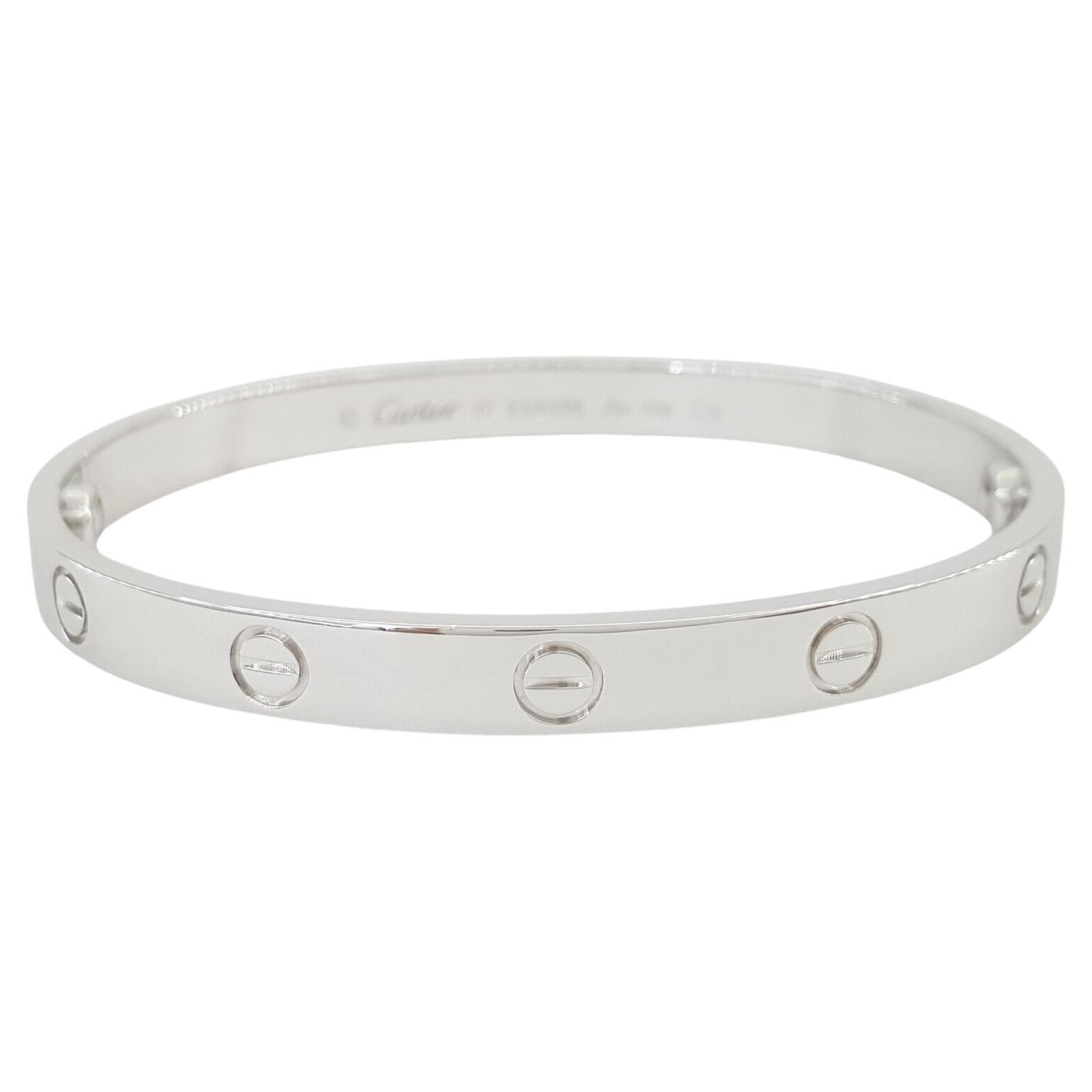  Cartier Love 18K White Gold Bracelet 6mm Wide Size 19.



The Bracelet weighs 37.5 grams of solid 18K White Gold, 6mm wide, Size 19 (7.4”), 62.8x52.7mm inner Diameter, is stamped 