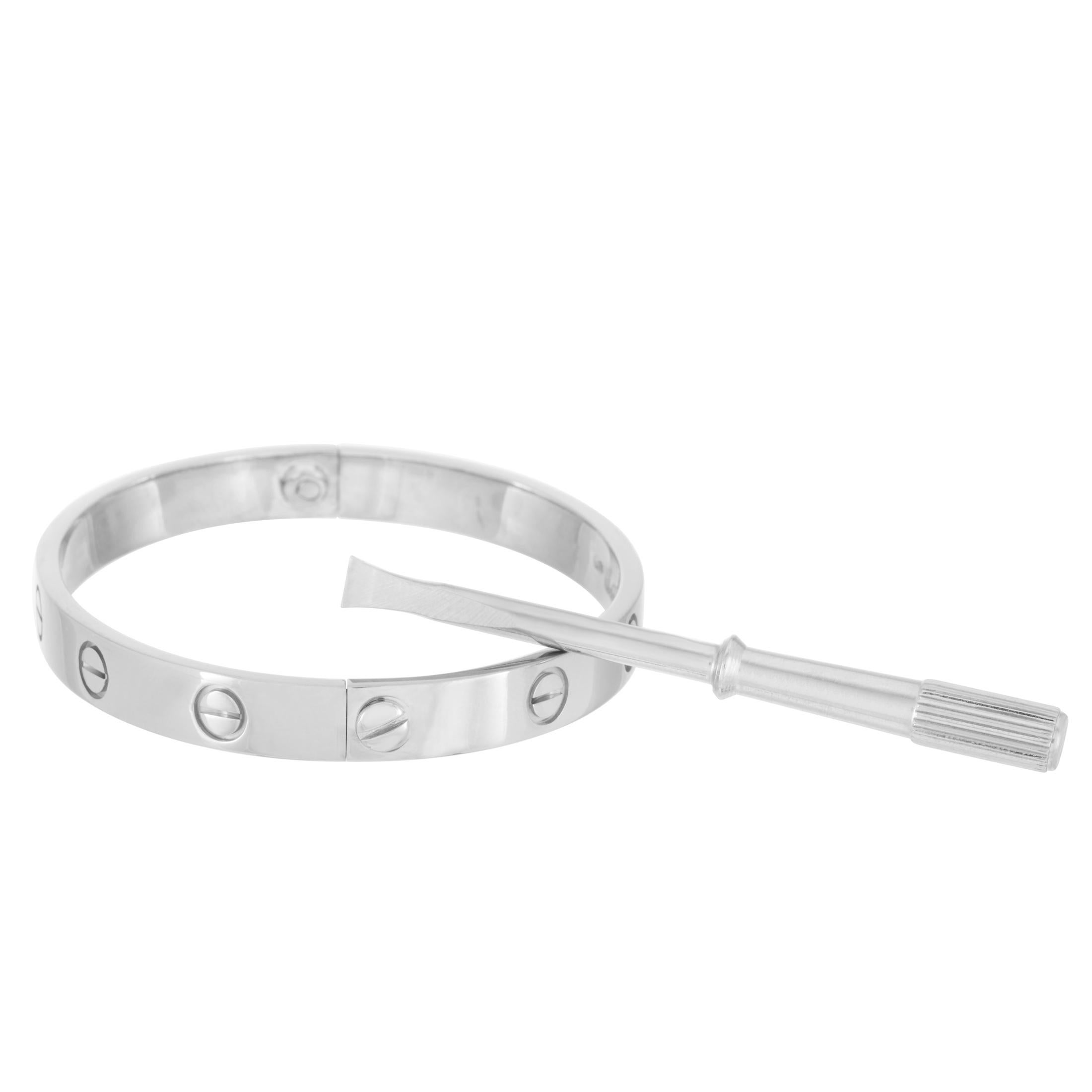 The Cartier “LOVE” bracelet is crafted from 18K white gold and measures 6.3” in length. The bracelet weighs 30.1 grams and is delivered with a screwdriver.