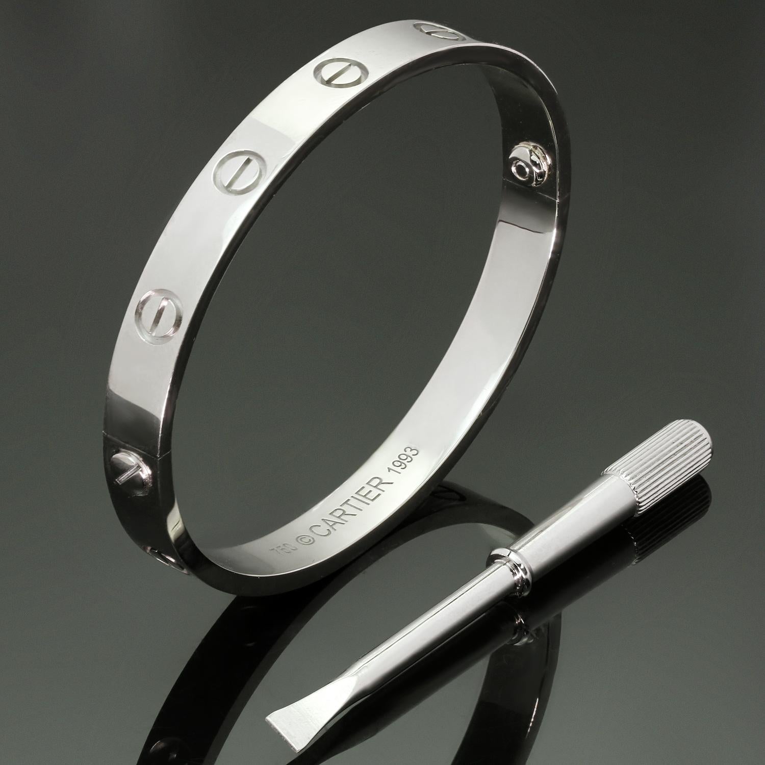 This classic Cartier bangle from the iconic Love collection is made in 18k white gold and comes with the original screwdriver. This bracelet is a size 16. Made in France circa 1993. Measurements: 0.23