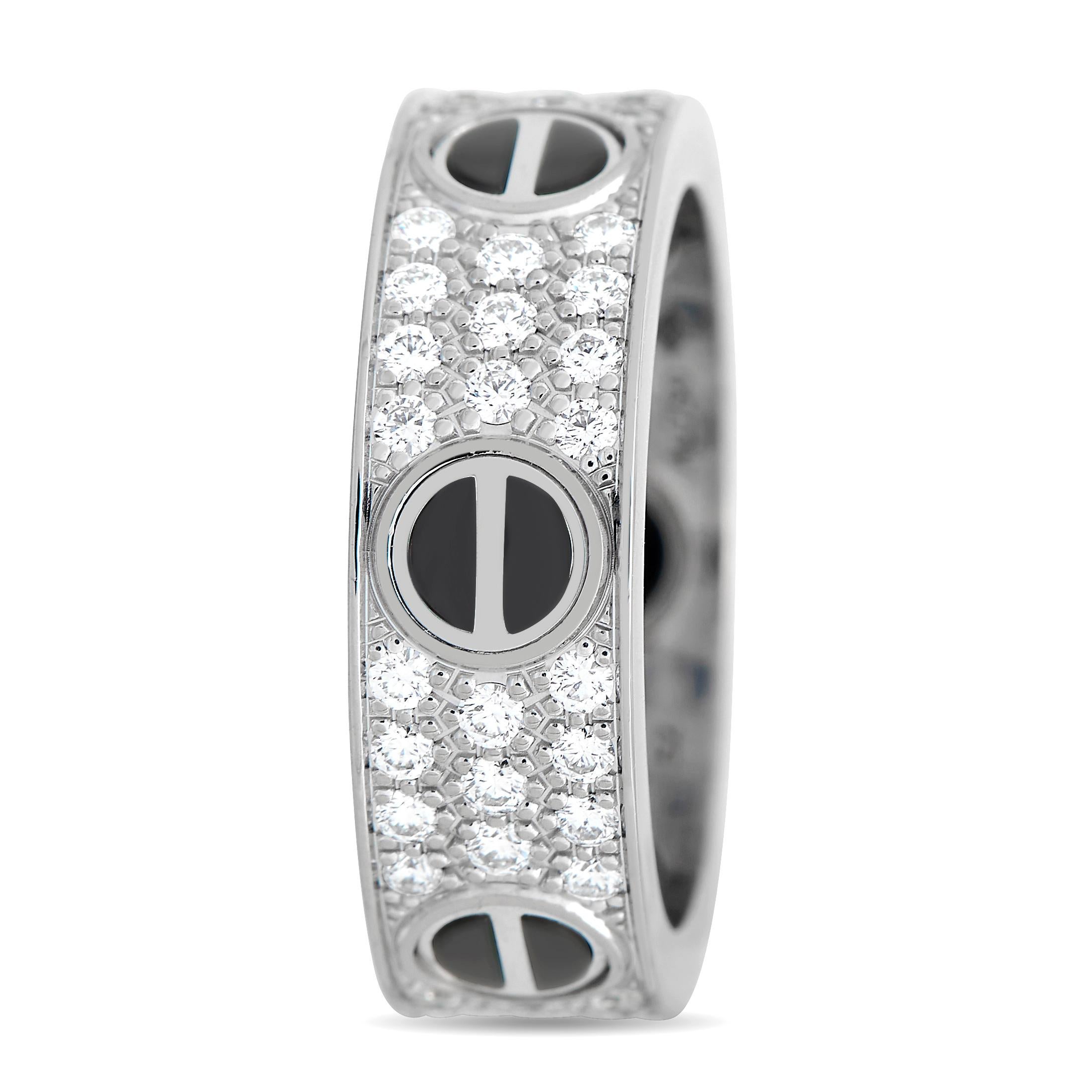 This gender-neutral LOVE ring from Cartier features an 18K white gold band measuring 6mm in thickness. It bears the iconic screw motif in black ceramic. The band is pavé-set with 66 brilliant-cut diamonds. 