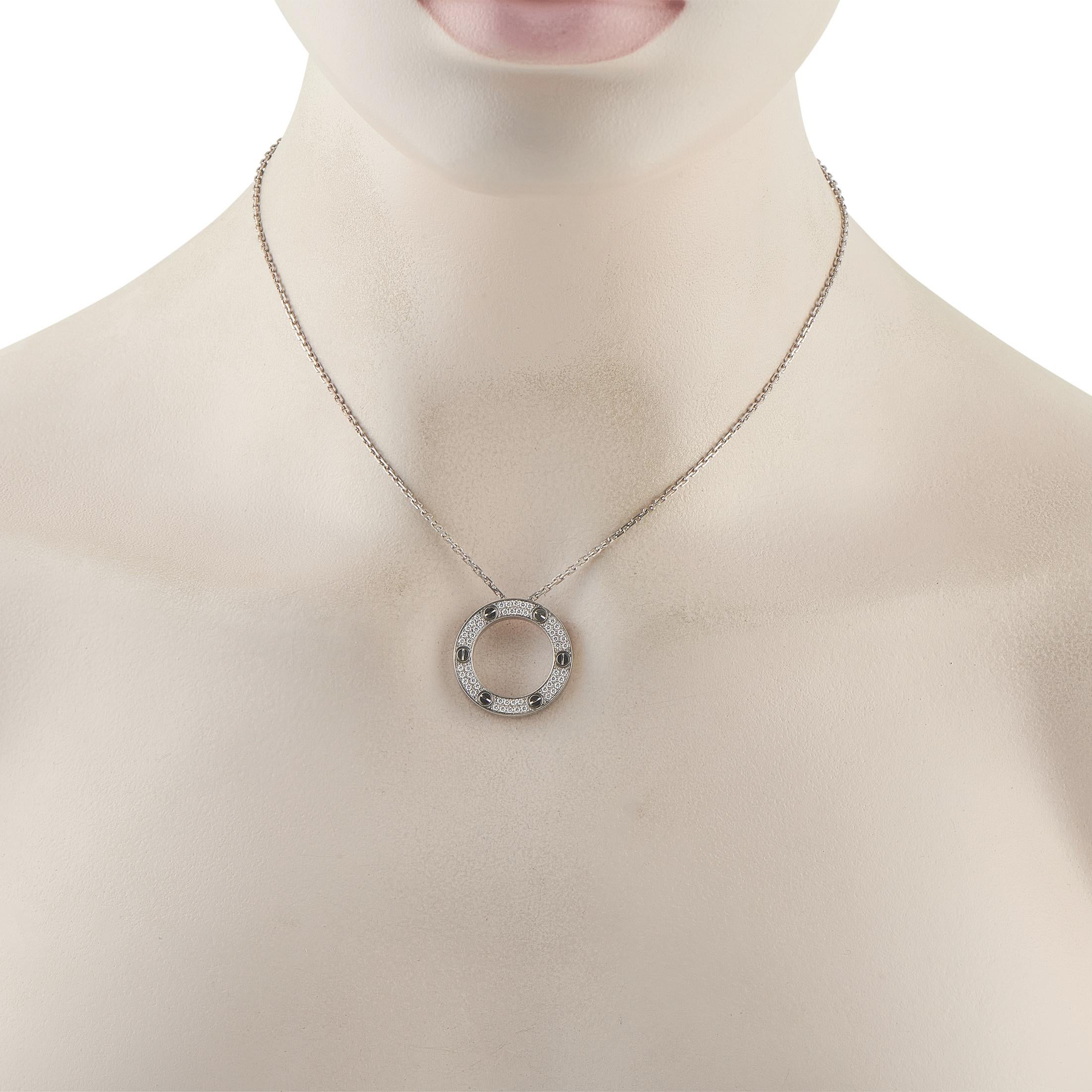 This Cartier LOVE necklace is a luxury piece that is ideal for everyday wear. This pieces circular pendant includes a series of screw motifs a signature feature of the popular collection. Sparkling inset Diamonds make this elegant accessory even