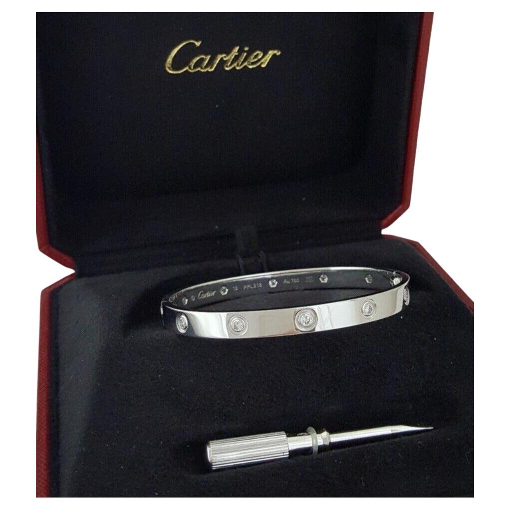 Presenting an exquisite Cartier Love Bracelet crafted from lustrous 18K white gold, adorned with 10 natural round diamonds of exceptional quality.

Size 18

Elegantly designed, this bracelet weighs 32.4 grams and measures 6.1mm wide, with a size 18