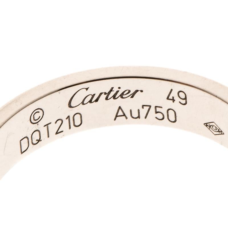 One of the most iconic and loved designs from the house of Cartier, this stunning Love mini ring is a symbol of style and luxury. Constructed in 18K white gold, this ring features screw details all around the ring as a symbol of sealed and secured