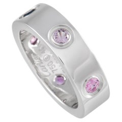 Cartier, bague Love en or blanc 18 carats et saphirs multicolores
