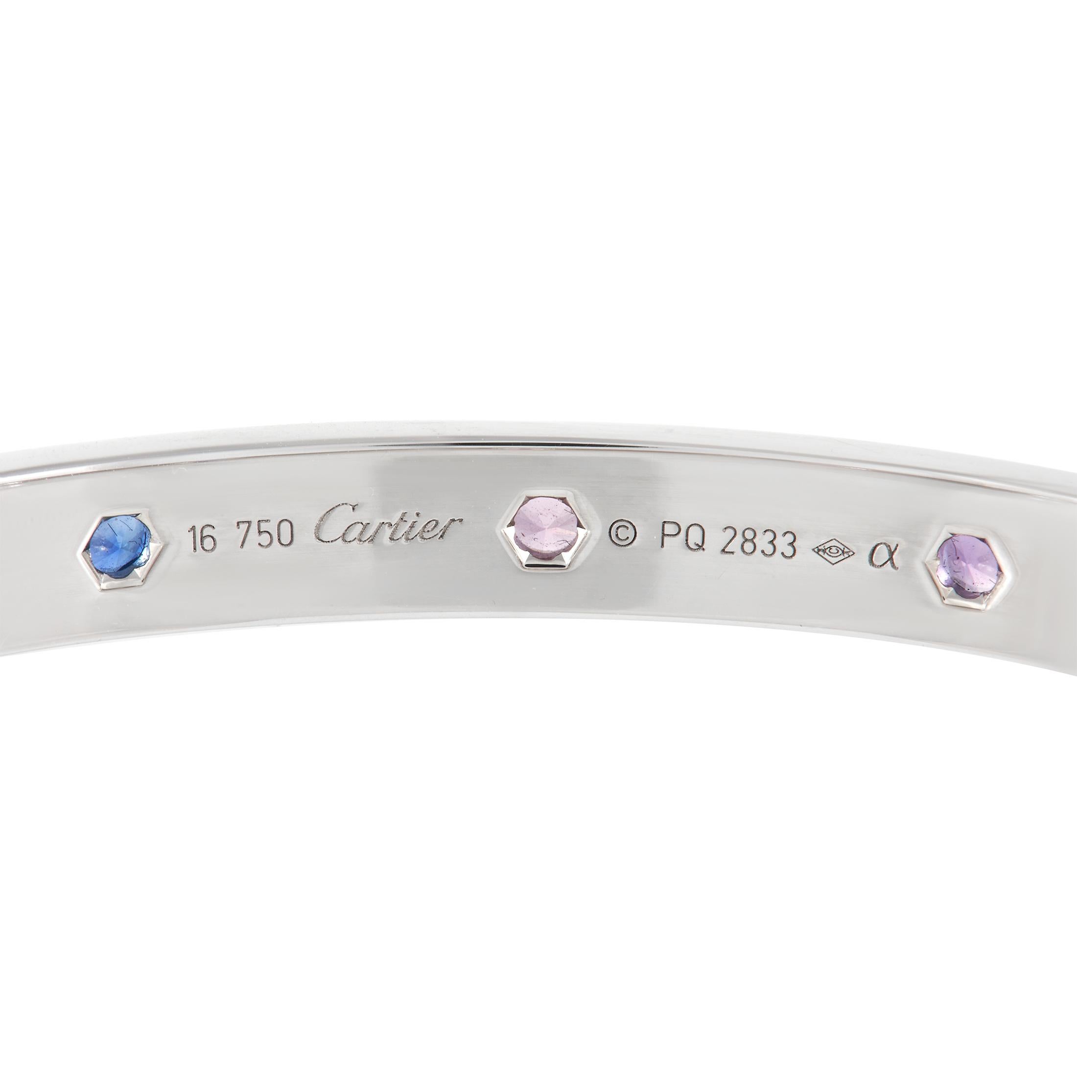 Shimmering, multicolored gemstones add extra personality to this luxurious Cartier LOVE bracelet. A sleek 18K white gold setting provides the perfect backdrop for this piece’s Pink Sapphires, Blue Sapphires, Aquamarine, Spinel, and Amethyst accents.