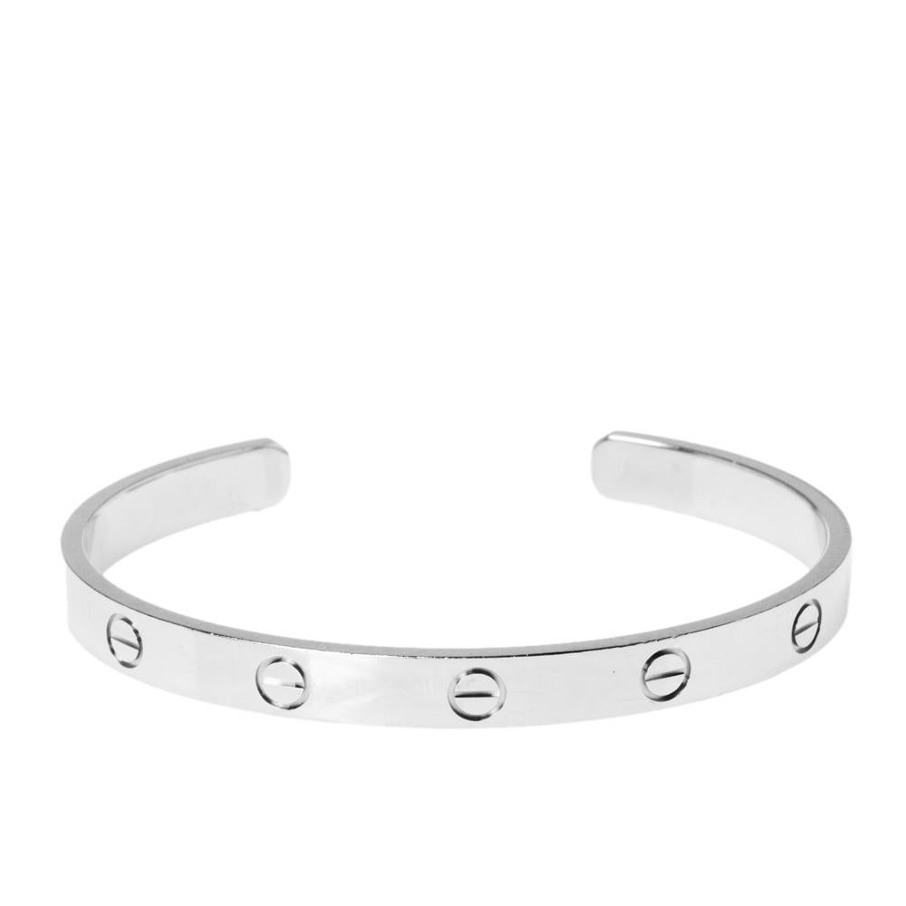 We fell in love with this Cartier LOVE bracelet at first glance. Look at its gorgeous yet subtle accents and picture how it will beautifully sit on your wrist and charm your peers. The creation is crafted from 18K white gold into an open cuff style