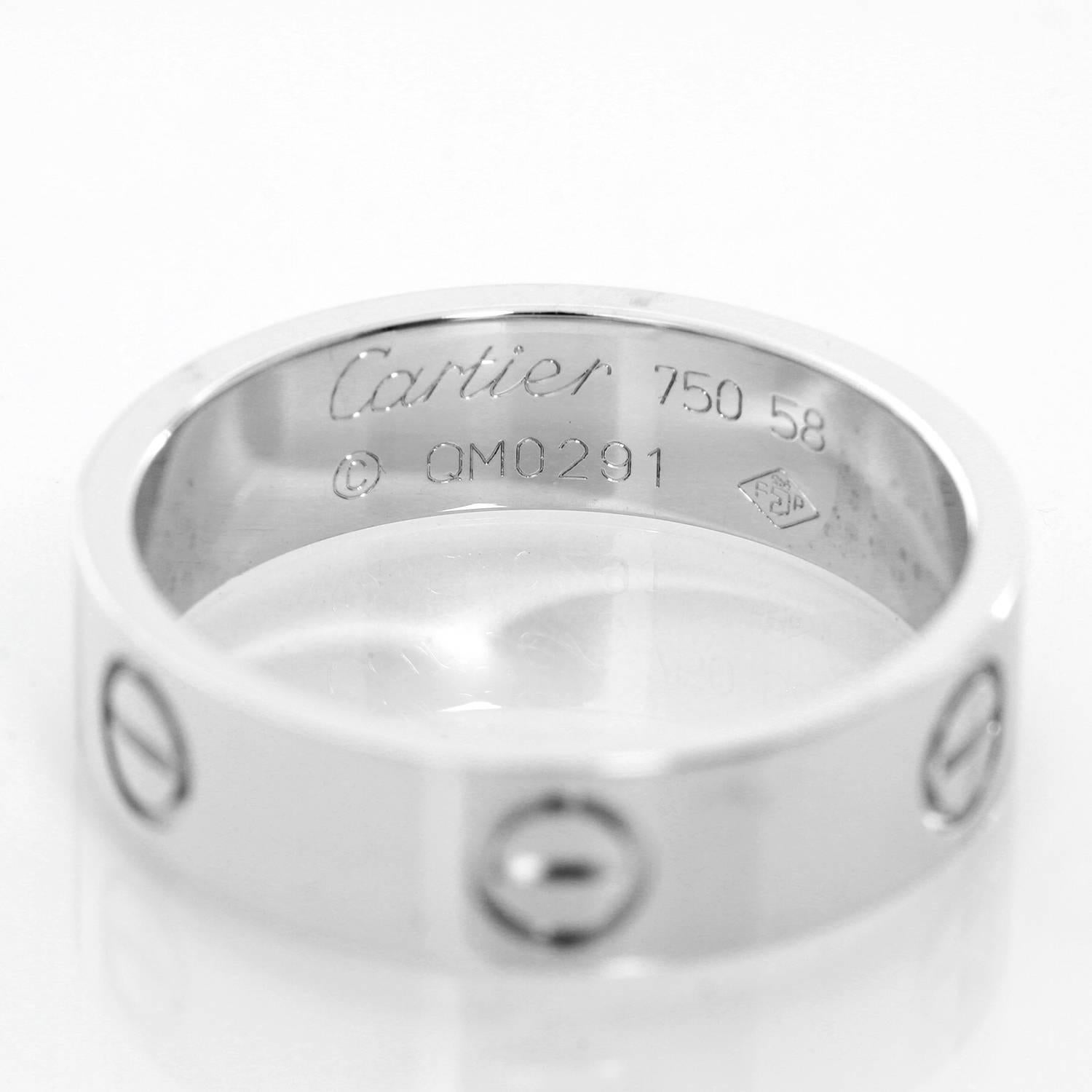 Cartier Love 18k White Gold Wedding Ring Band Sz. 58 (8-3/4)) - . This genuine Cartier Love ring measures 5.5 mm in width. It is stamped Cartier, 750, 58, QM0291 Size is 58 (8-3/4)). Authenticity guaranteed! Pre-owned with Cartier box.