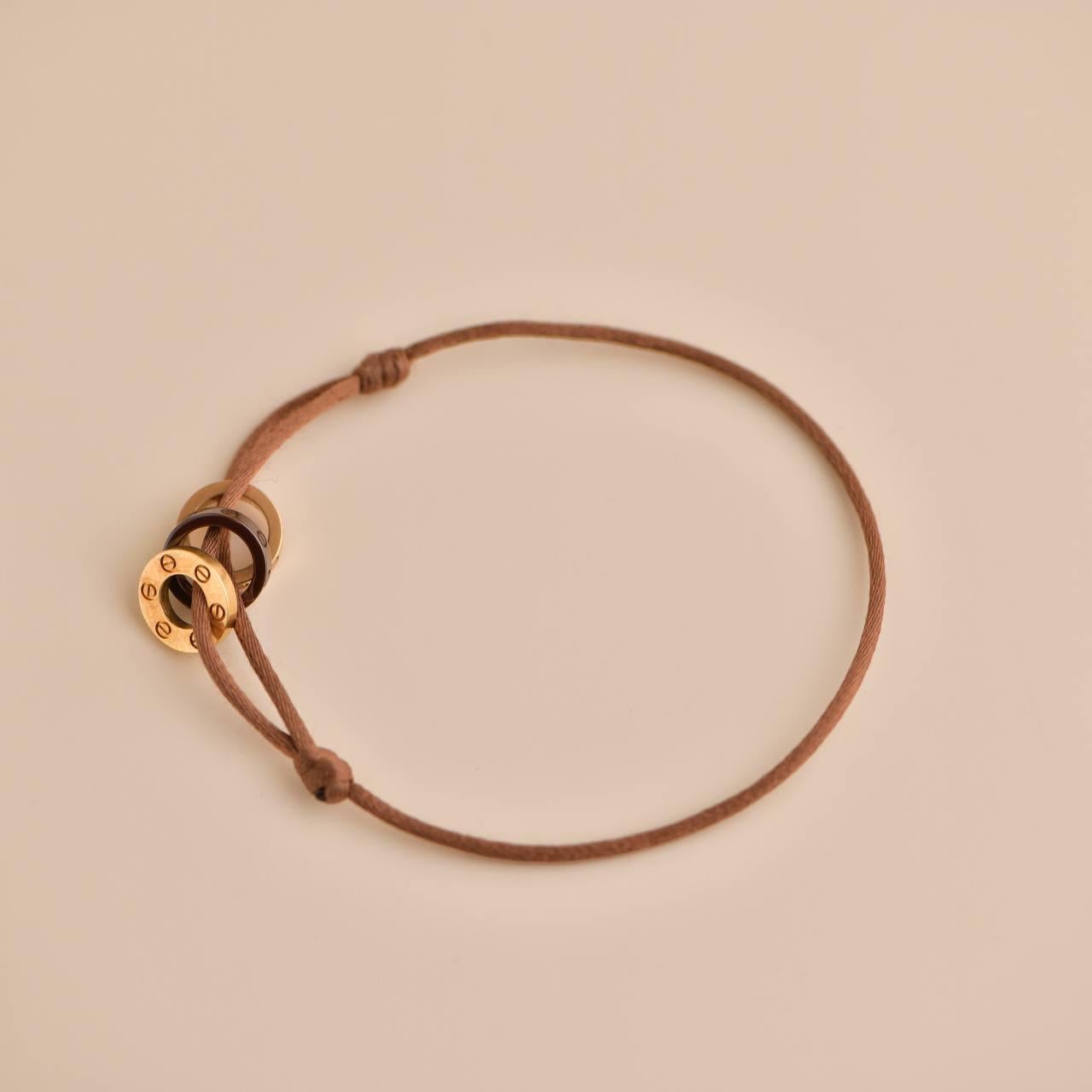 Cartier Love 18k Yellow and Rose 4 Diamond Sevres Porcelain Brown Cord Bracelet In Excellent Condition In Banbury, GB