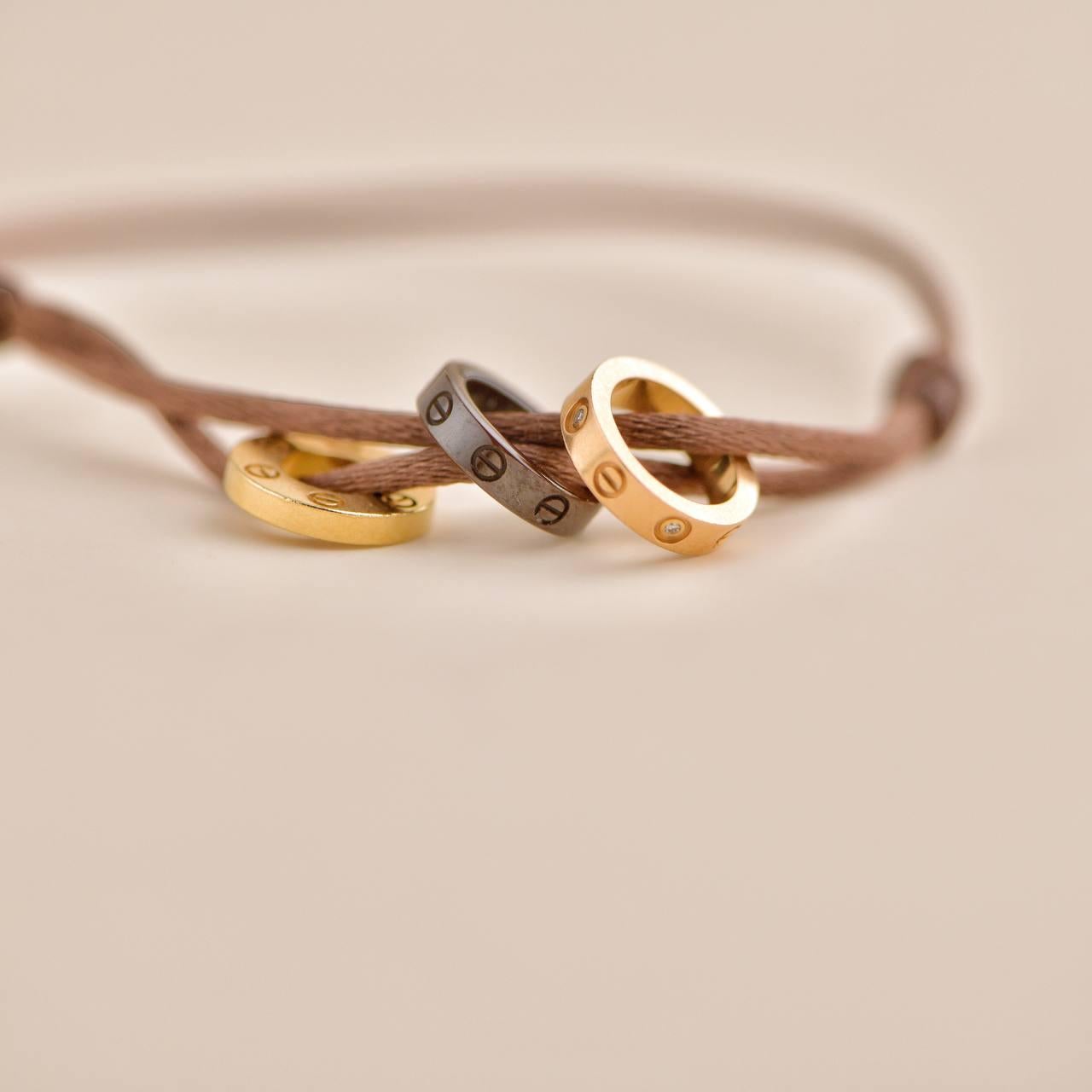 Cartier Love 18k Yellow and Rose 4 Diamond Sevres Porcelain Brown Cord Bracelet In Excellent Condition In Banbury, GB