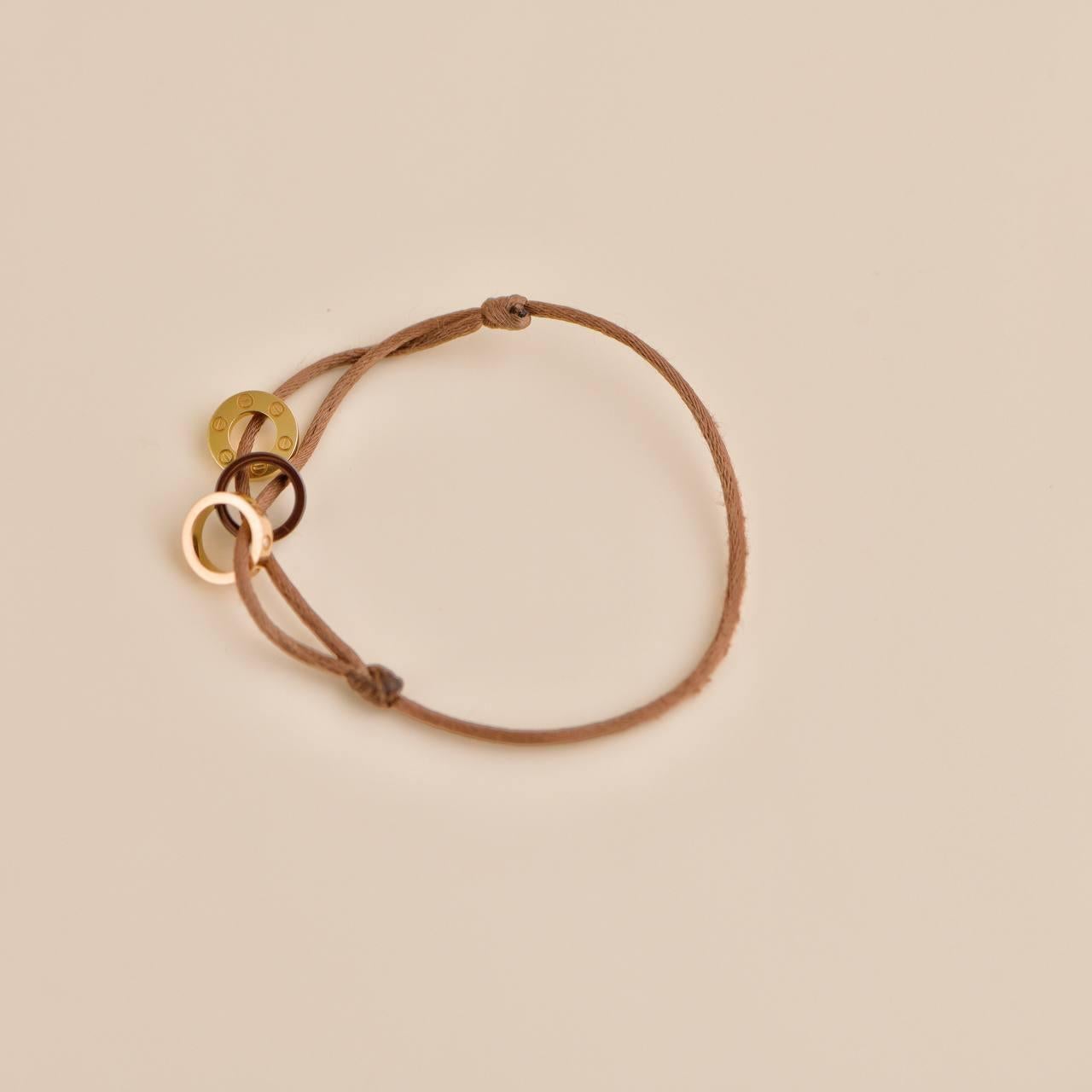 Cartier Love 18k Yellow and Rose 4 Diamond Sevres Porcelain Brown Cord Bracelet In Excellent Condition In Banbury, GB