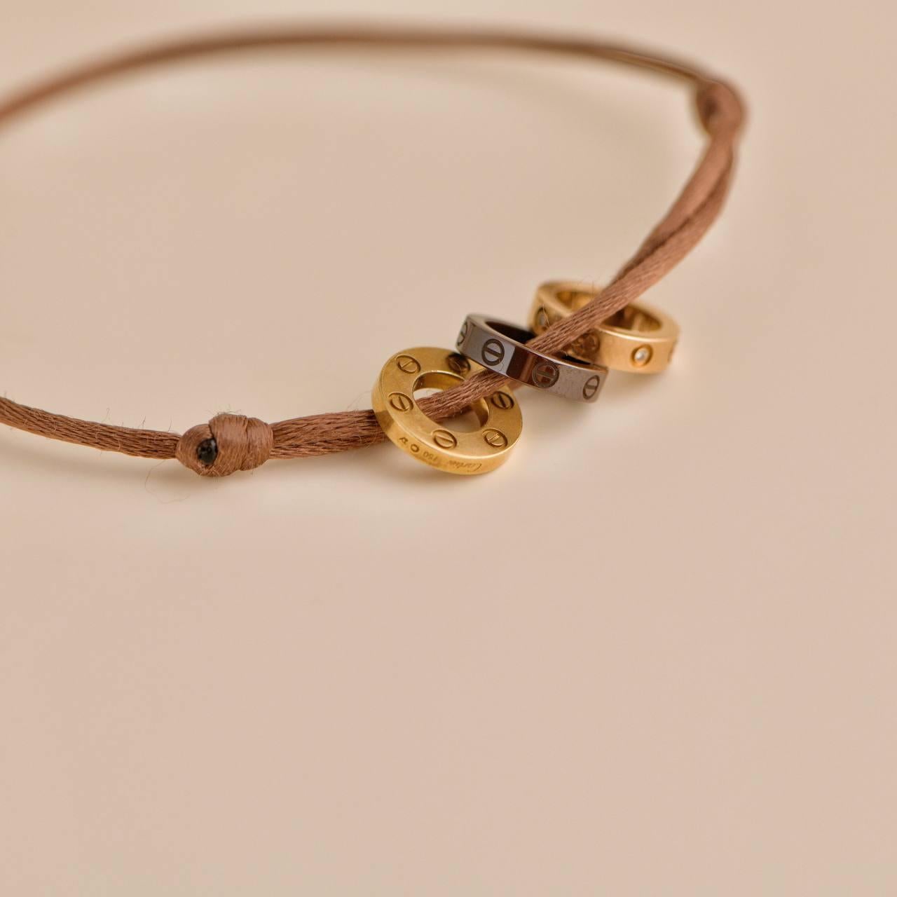 Women's or Men's Cartier Love 18k Yellow and Rose 4 Diamond Sevres Porcelain Brown Cord Bracelet