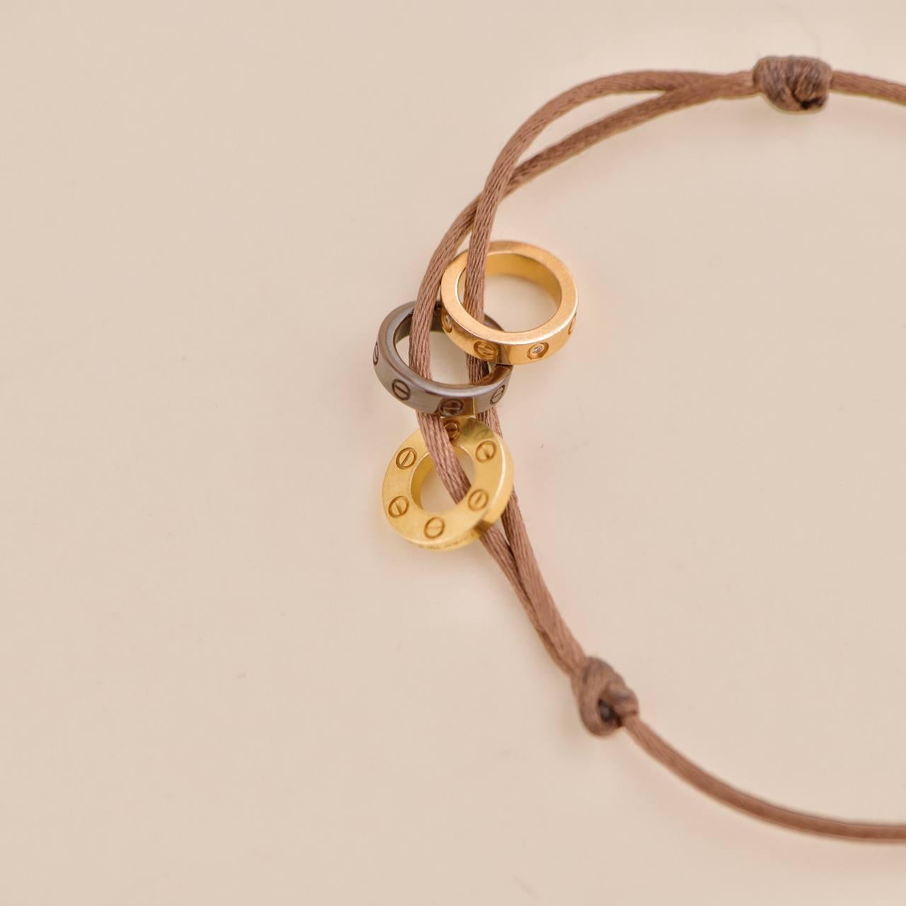 Women's or Men's Cartier Love 18k Yellow and Rose 4 Diamond Sevres Porcelain Brown Cord Bracelet