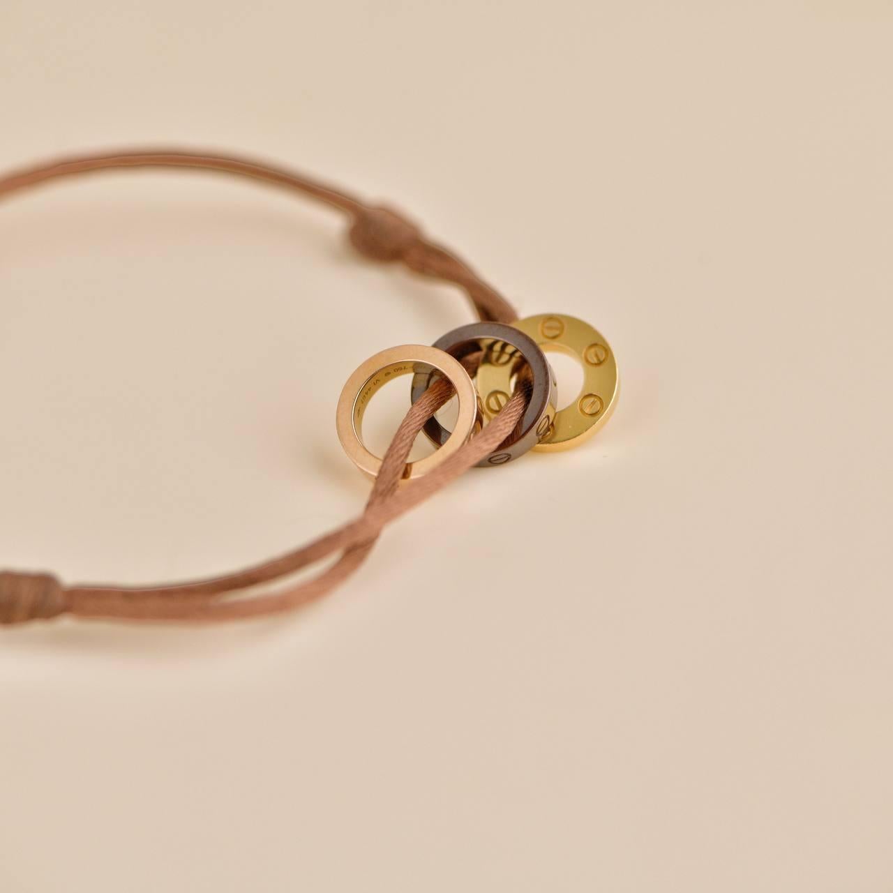 Women's or Men's Cartier Love 18k Yellow and Rose 4 Diamond Sevres Porcelain Brown Cord Bracelet