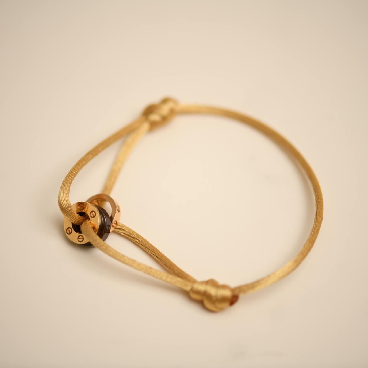 Women's or Men's Cartier Love 18k Yellow and Rose 4 Diamond Sevres Porcelain Cord Bracelet