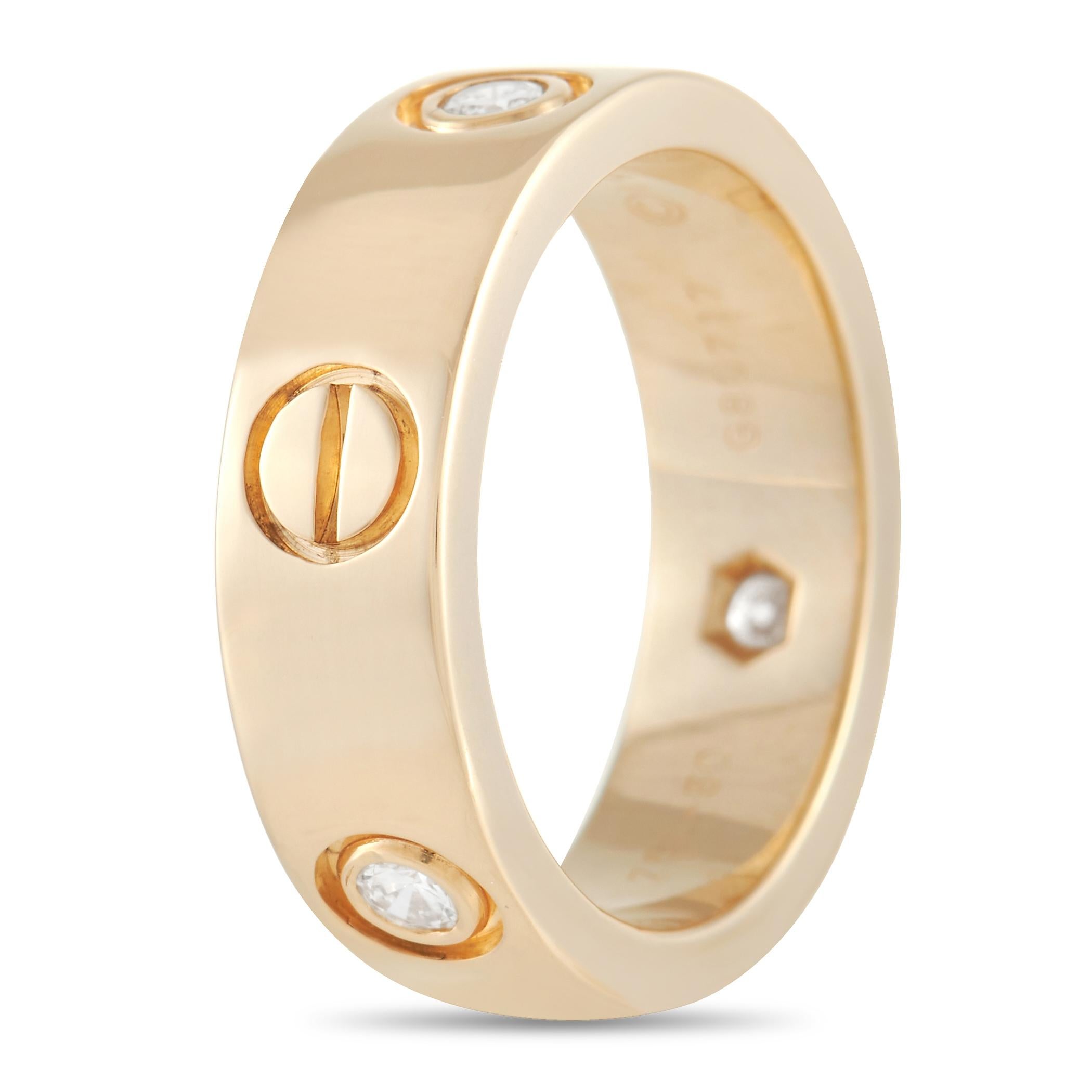 It doesn’t get any more iconic than this piece from the Cartier LOVE collection. This band ring measures 5mm wide and is crafted from opulent 18K Yellow Gold. Around the entire perimeter, you’ll find a trio of inset diamonds that alternate with the