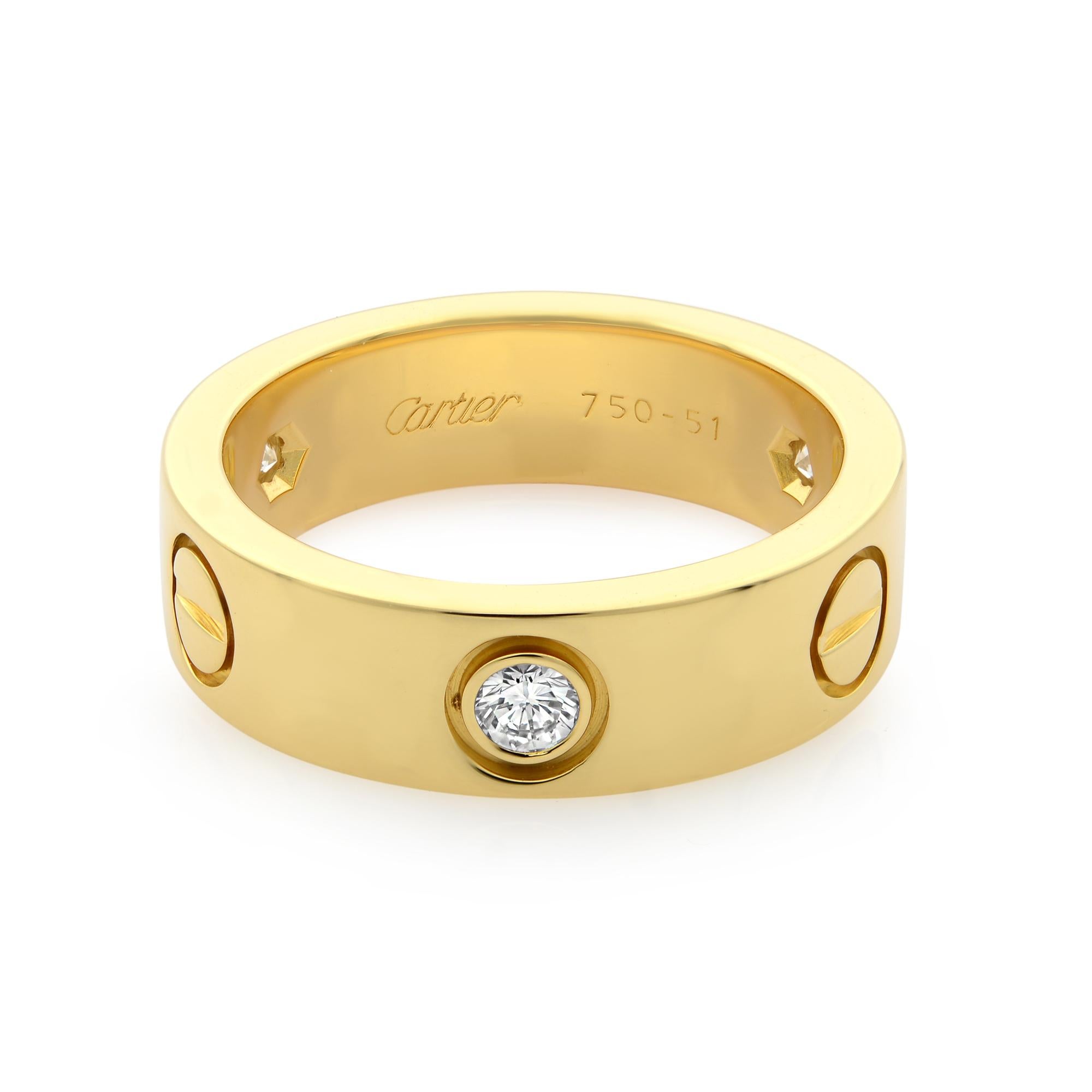 Cartier Love ring, 18K yellow gold, set with 3 brilliant-cut diamonds totaling 0.22 carats. Width: 5.5mm. Size 51, US 5.75
Excellent pre-owned condition. Comes with box and without papers. 