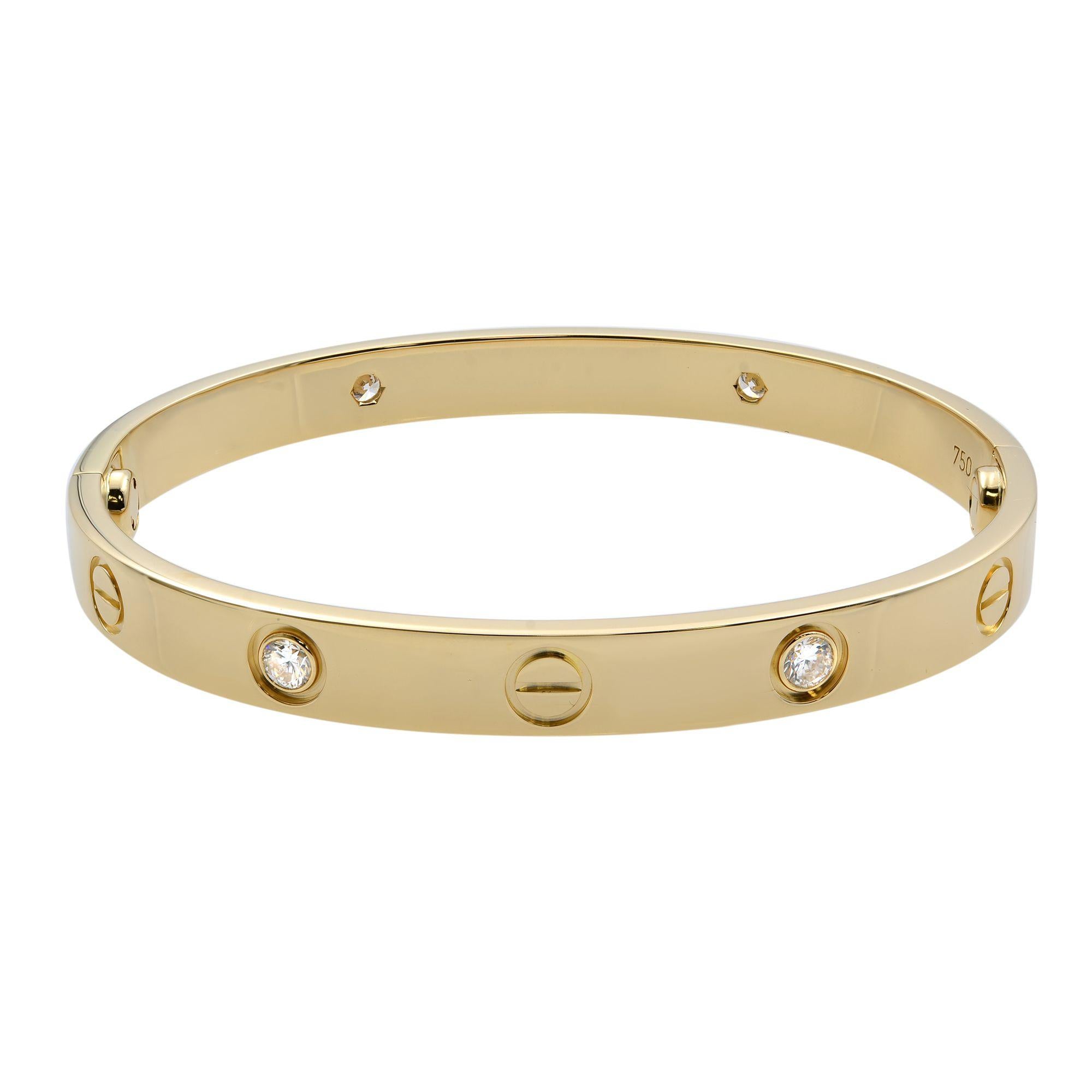Cartier Love bracelet, 18K yellow gold, set with 4 brilliant-cut diamonds totaling 0.42 carats. New Style. Width: 6.1mm. Size 16. Great pre-owned condition. Sold with box and a screwdriver. No papers. 

