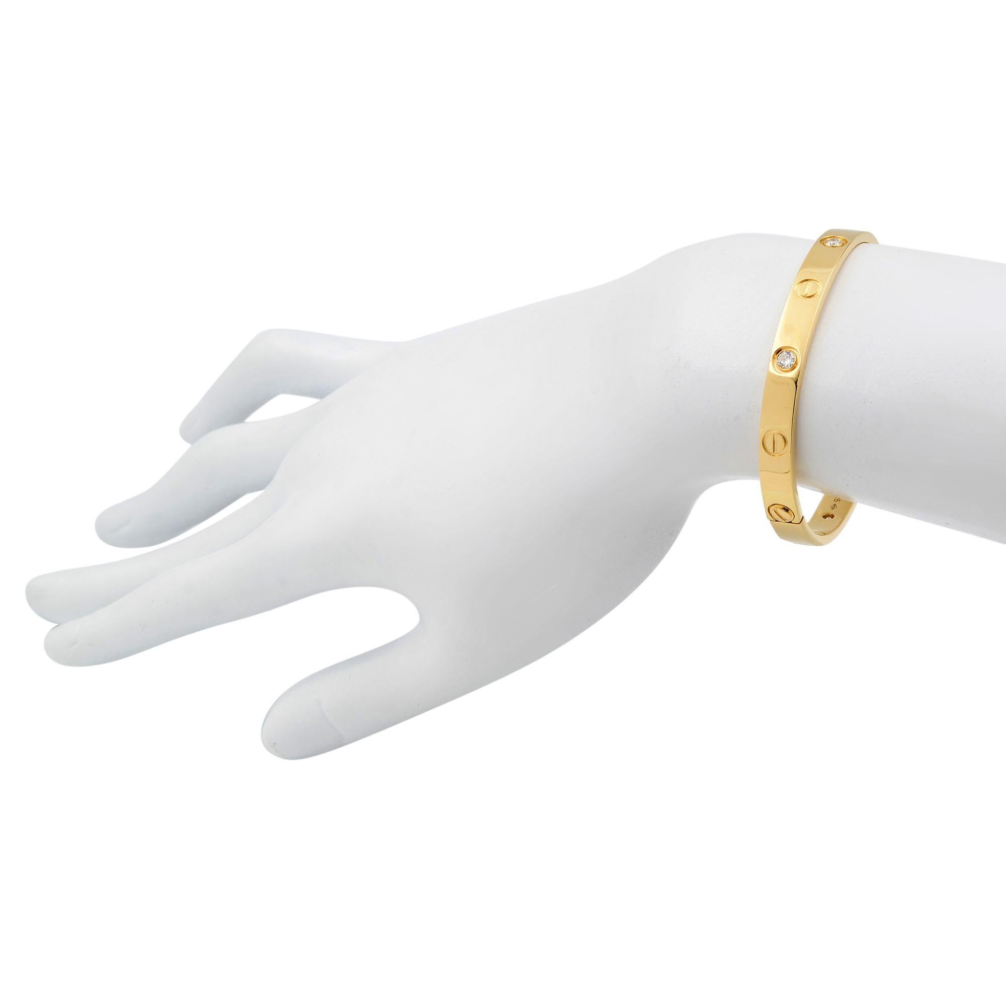 Cartier Love 18 Karat Yellow Gold 4 Diamond Bracelet In Excellent Condition In New York, NY