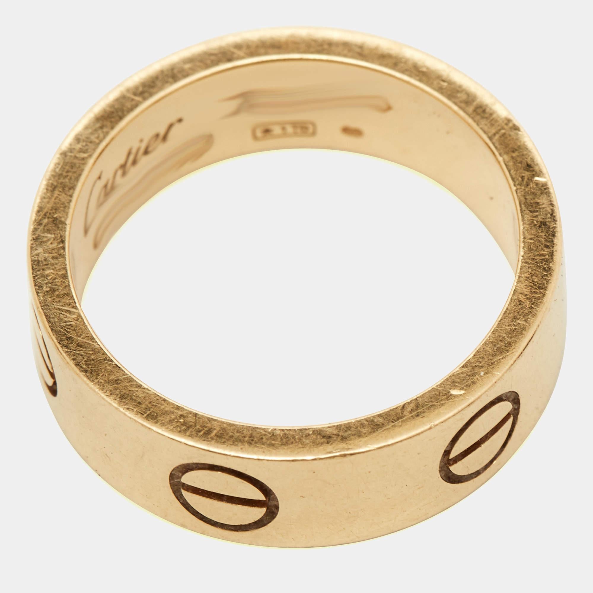 This stunning Love ring is an icon of style and luxury. Constructed in 18k yellow gold, this ring features screw details all around the surface as symbols of a sealed and secured bond. This ring is sure to become your everyday essential.

