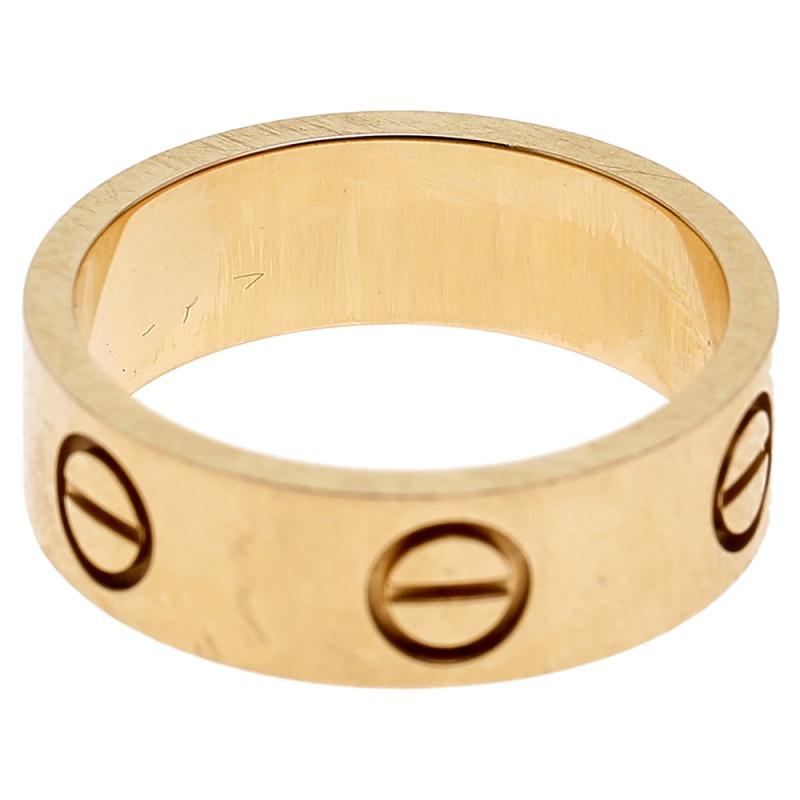 Contemporary Cartier Love 18K Yellow Gold Band Ring Size 49
