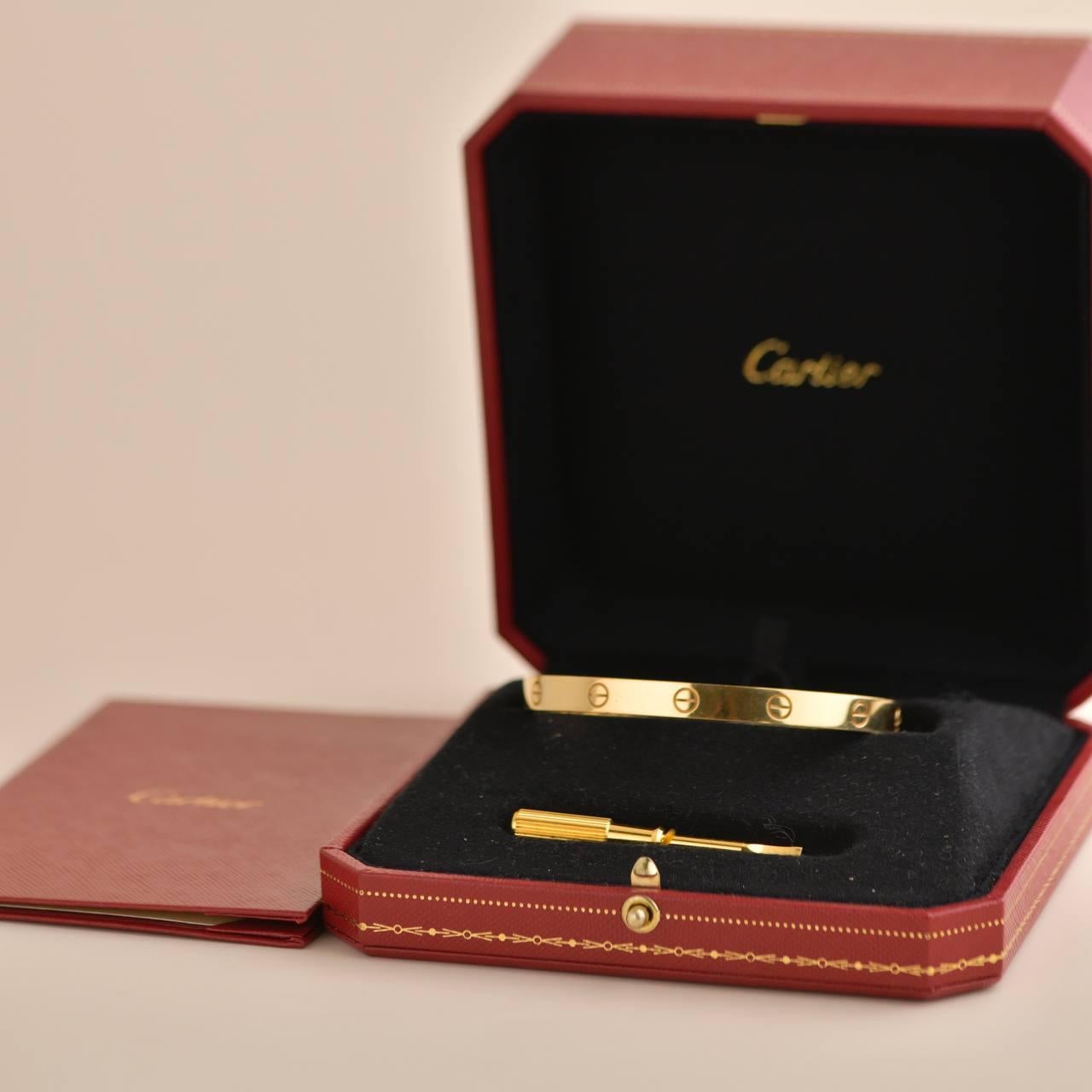 SKU	AT-2656
Comes With	Full Set (Pouch + Card)
Date	2020
RRP	£7,050 Incl. Taxes / �€7,950 Incl. Taxes / $7,350 Excl. Taxes
Model	B6035519
Serial Number	GQ****
Size	19 Size Guide
Metal	18k Yellow Gold
Weight	Approximately 37.2
