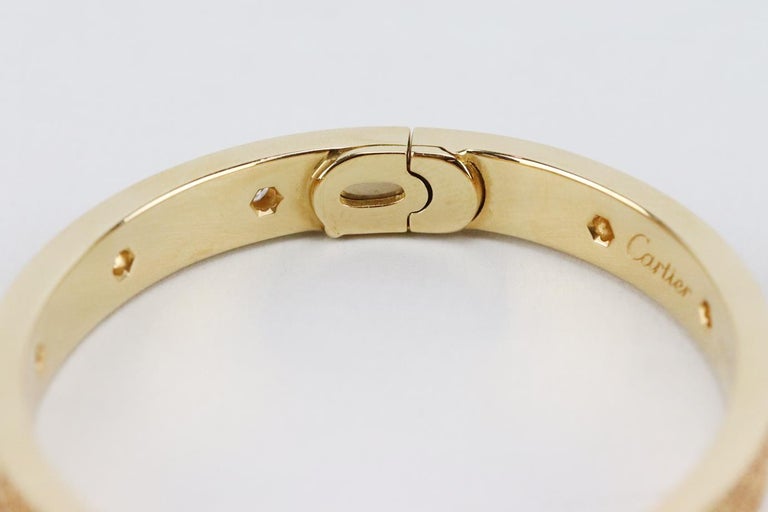 Cartier Love Bracelet en or jaune 18 carats, diamants et grenats  spessartites 16 cm En vente sur 1stDibs